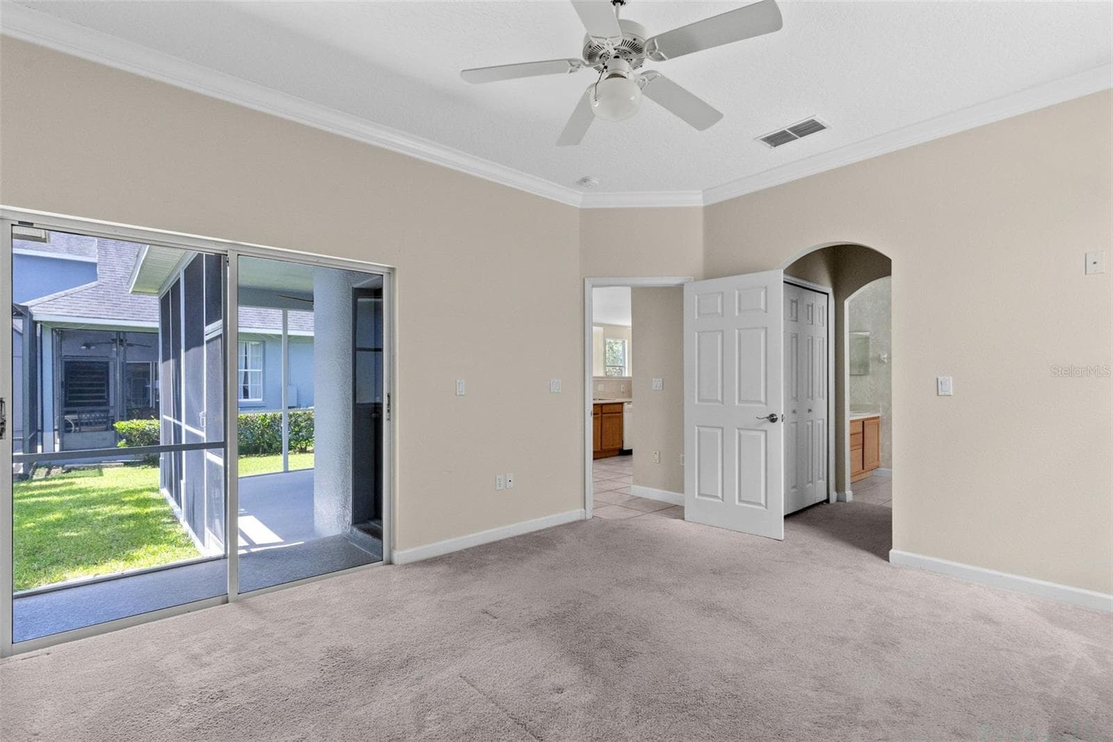 Master Bedroom with sliders out to back patio - 3919 PEPPERVINE DR, ORLANDO