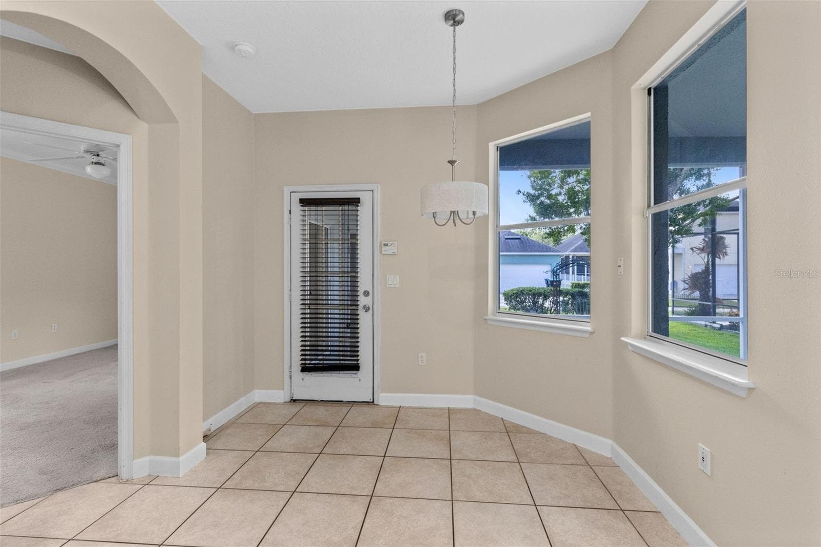 Dinette showing the door leading to the garage - 3919 PEPPERVINE DR, ORLANDO