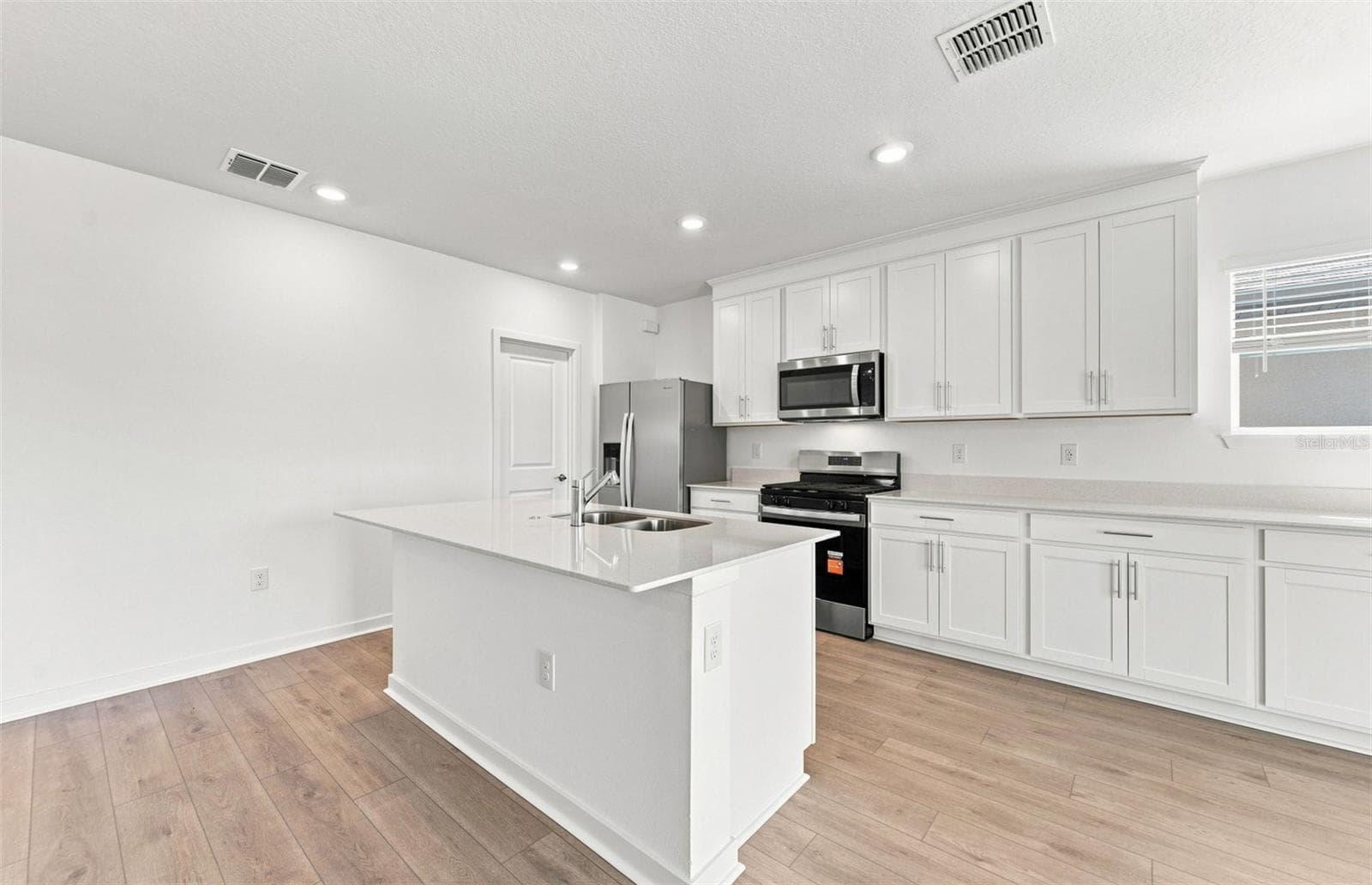 Stylish Kitchen - 9029 WILDLIGHT TRL, WILDWOOD
