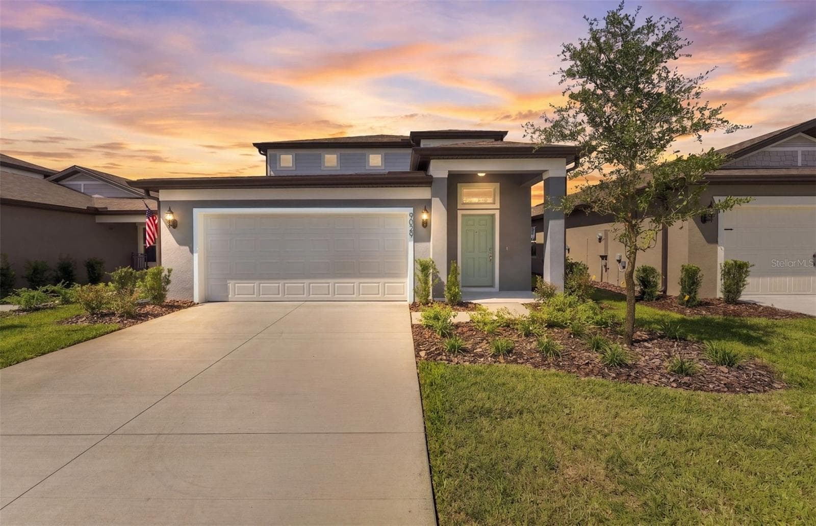 Pinecrest Exterior - 9029 WILDLIGHT TRL, WILDWOOD