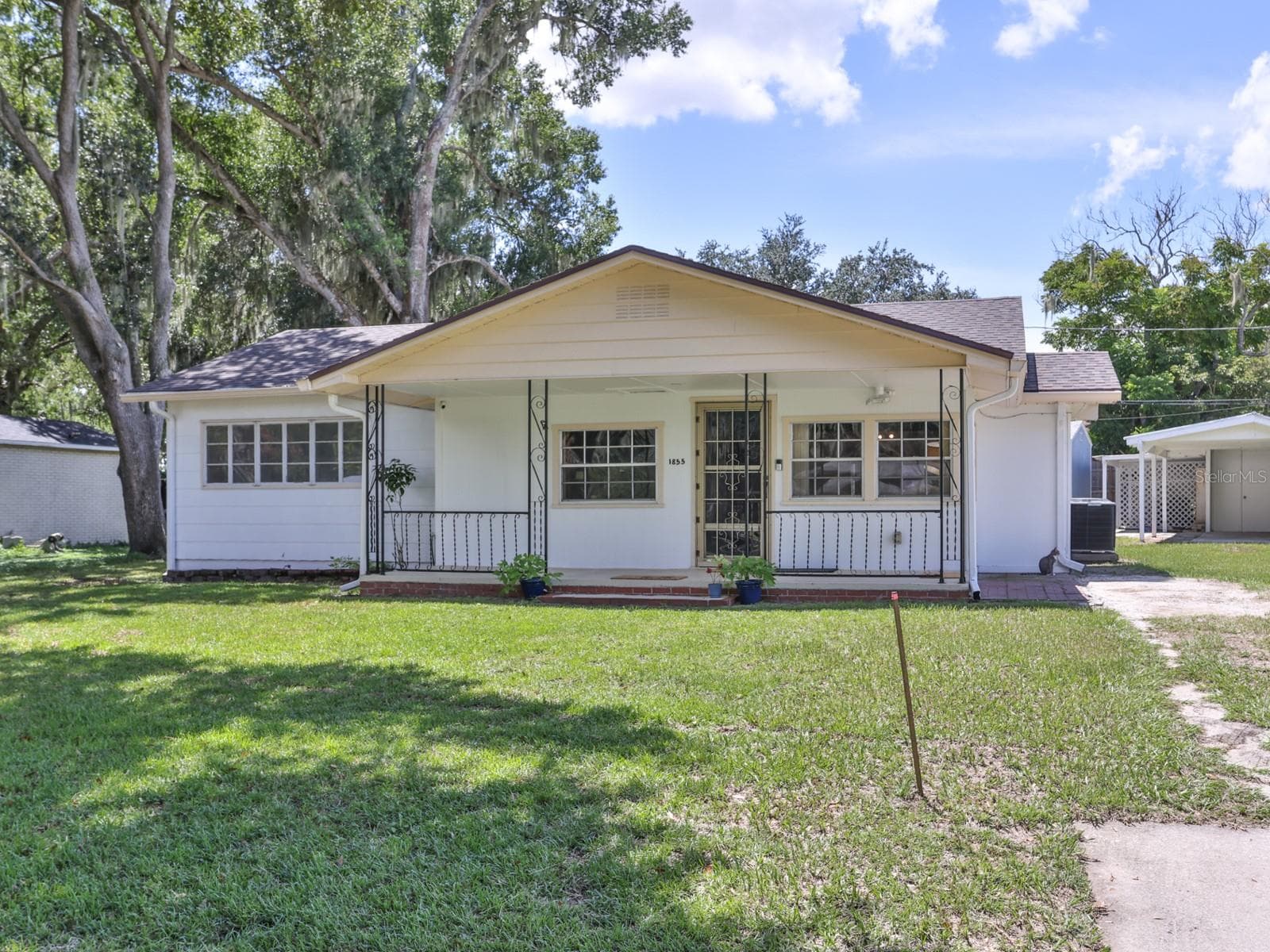 Front of the home. - 1855 E VALENCIA DR, BARTOW