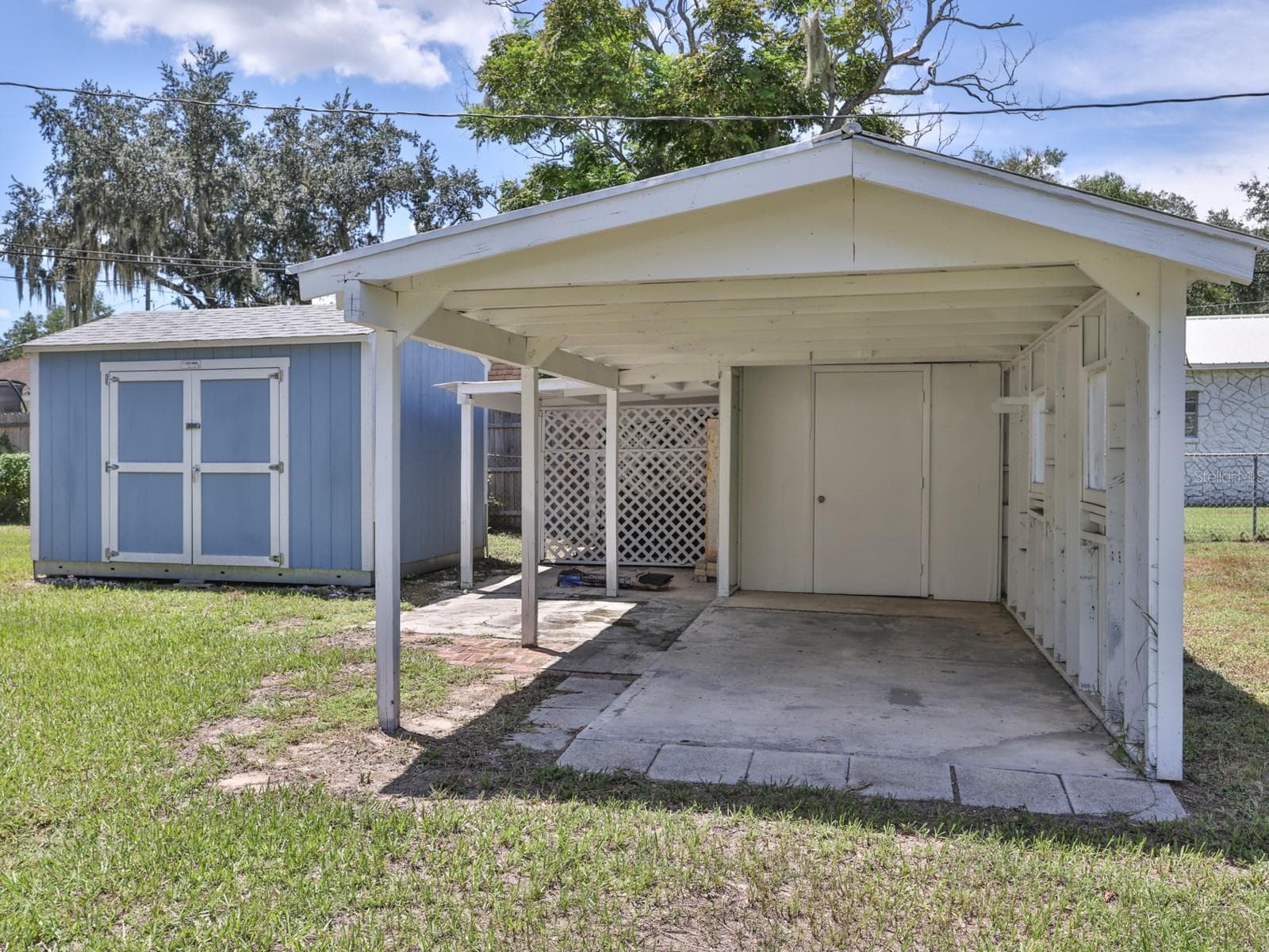 One car carport. Extra storage shed. - 1855 E VALENCIA DR, BARTOW