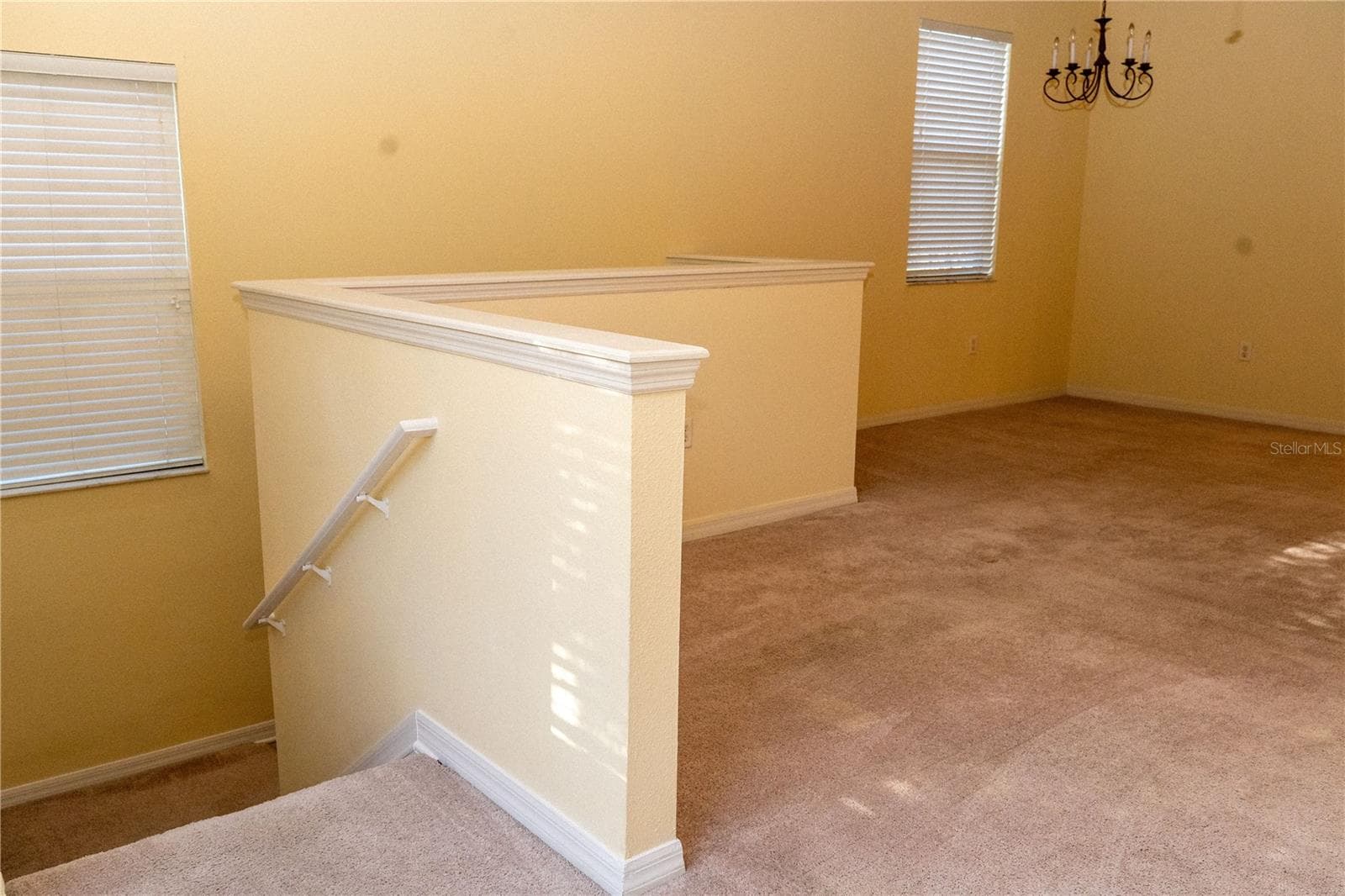 Front Stairwell to Living Room - 4316 VIA PIEDRA CIR #5-204, SARASOTA