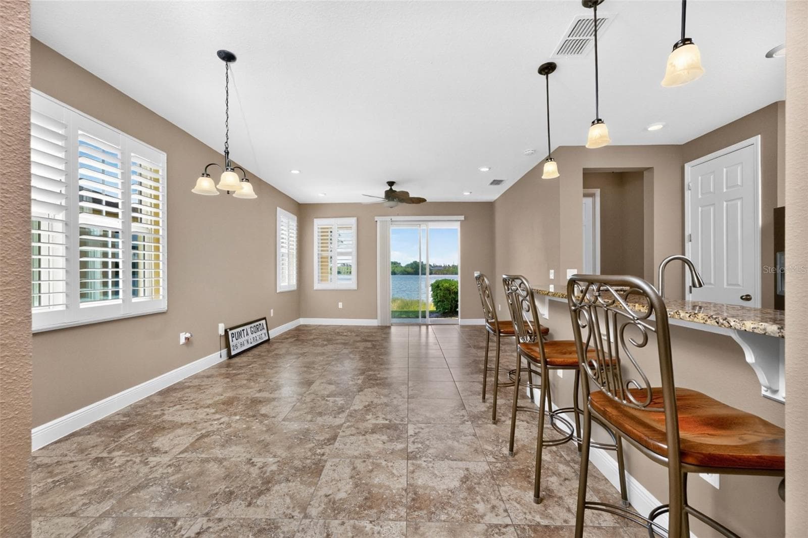 Dining room/Living Room - 8849 TUSCANY ISLES DR, PUNTA GORDA