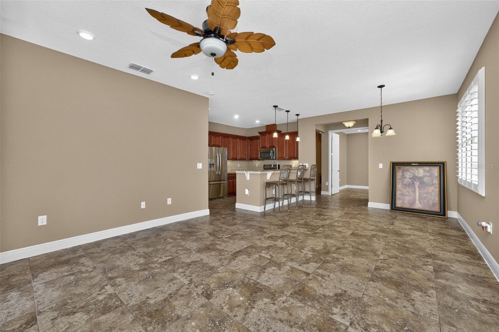 Living Room,Dining room and kitchen view - 8849 TUSCANY ISLES DR, PUNTA GORDA