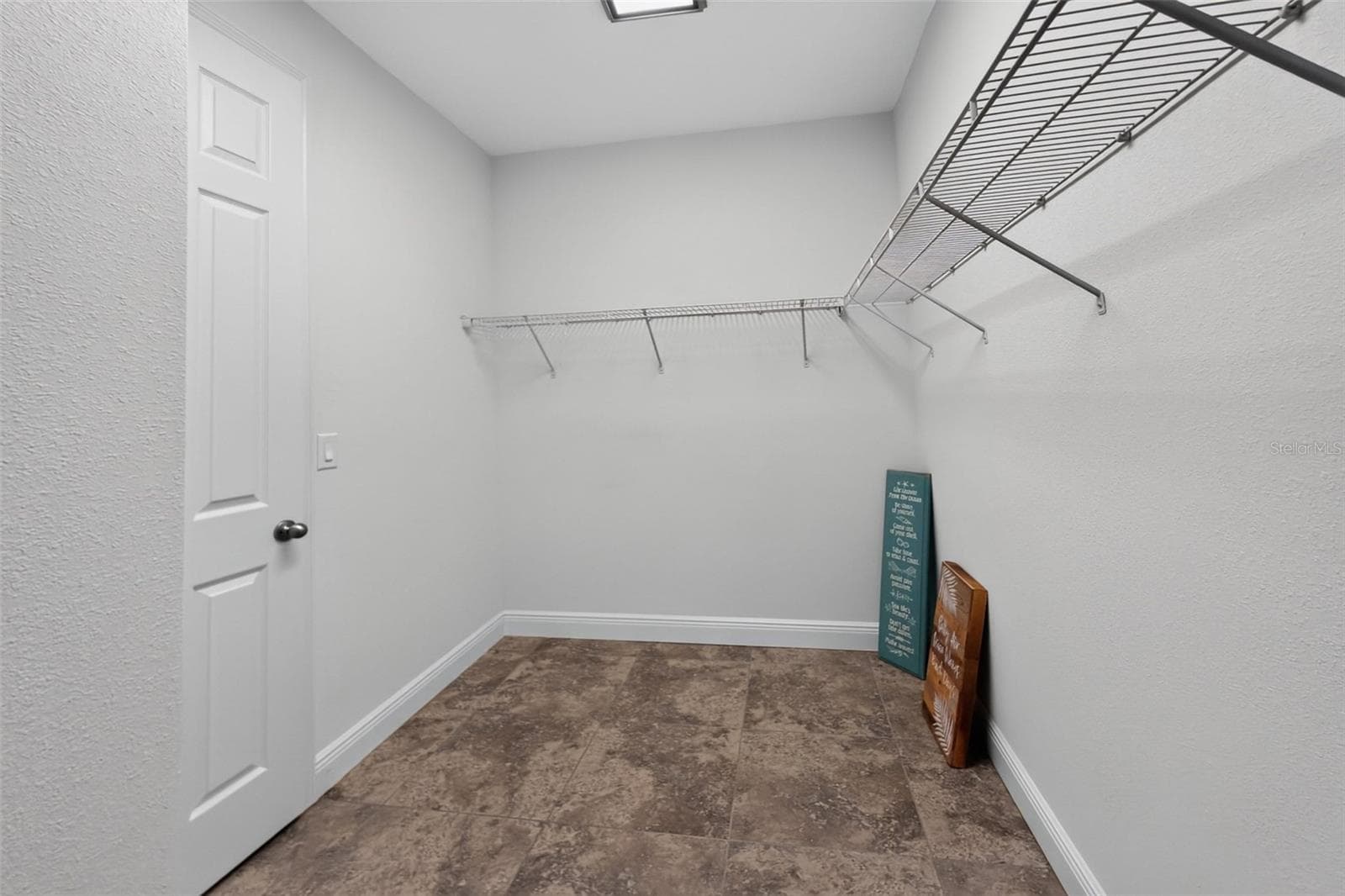 closet in primary bedroom - 8849 TUSCANY ISLES DR, PUNTA GORDA