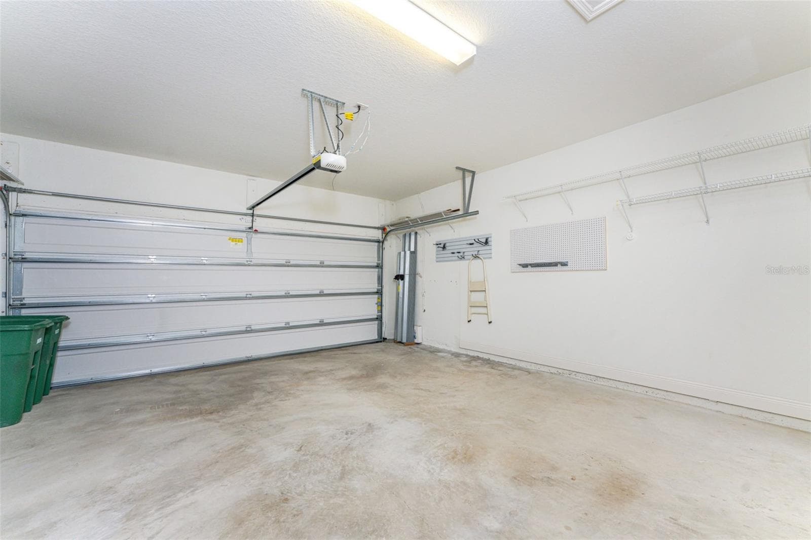 2 car garage - 8849 TUSCANY ISLES DR, PUNTA GORDA