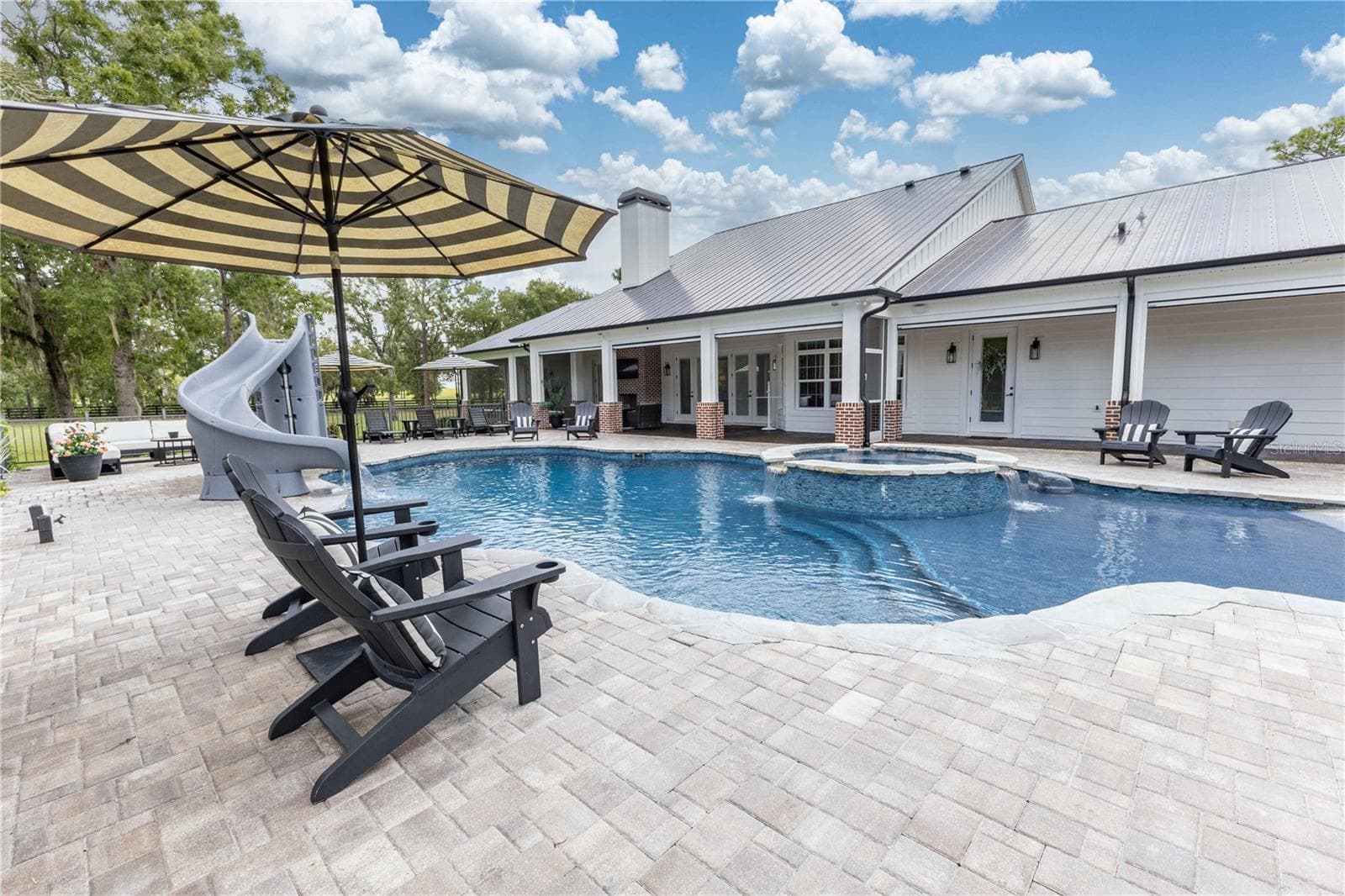 Resort style pool - 2870 NW 87TH AVE, WILDWOOD