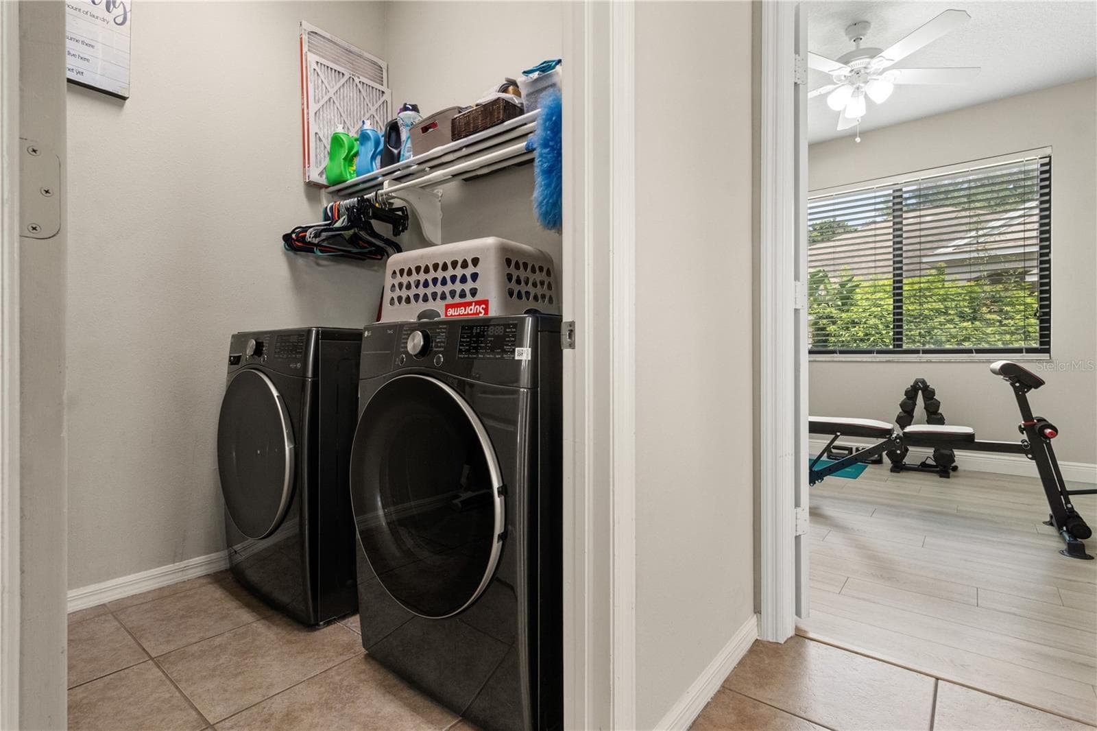 Laundry room is just off the kitchen - 5824 FISH CROW PL, LAND O LAKES