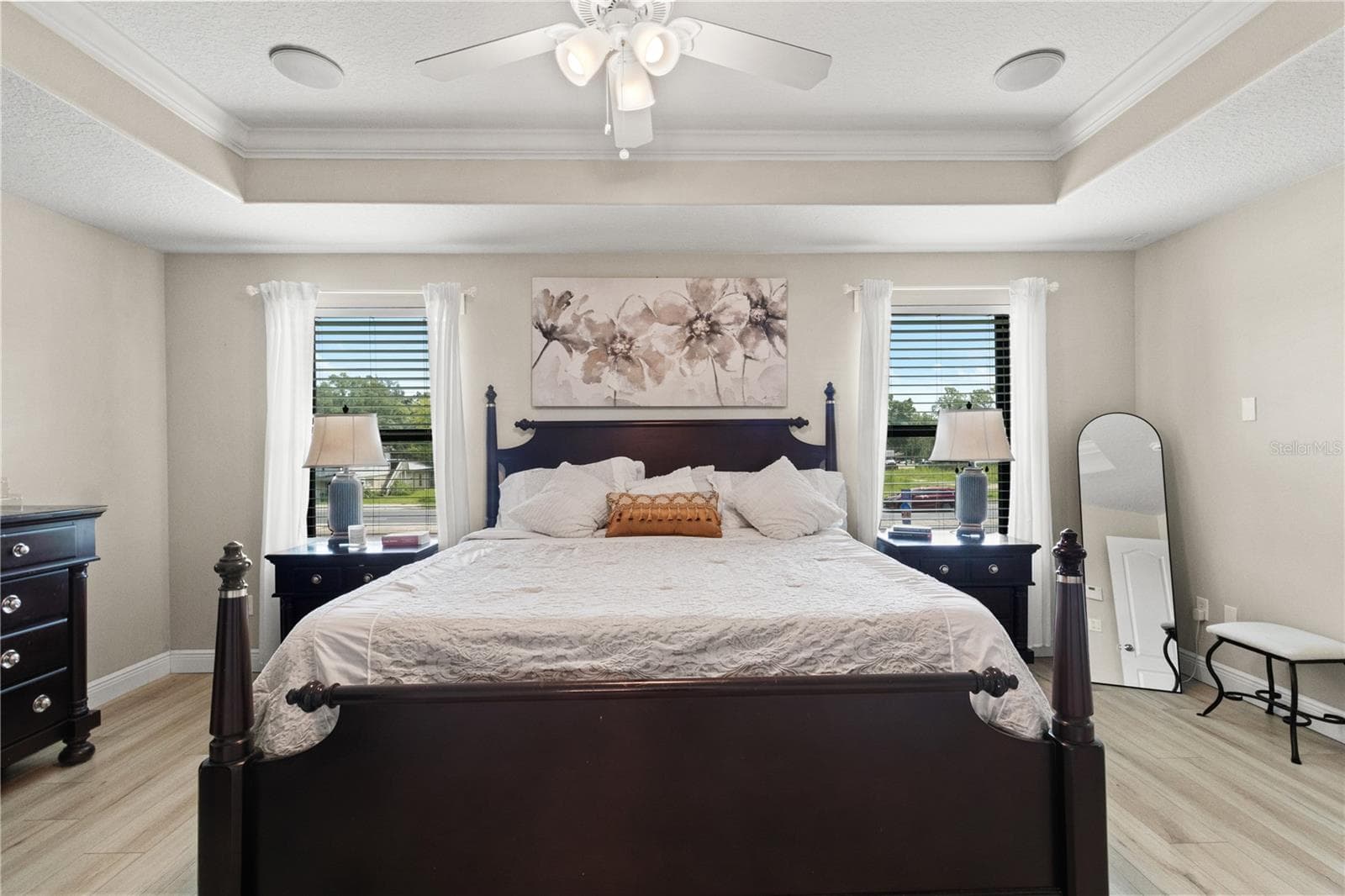 Stately upstairs primary suite with luxury vinyl floors - 5824 FISH CROW PL, LAND O LAKES