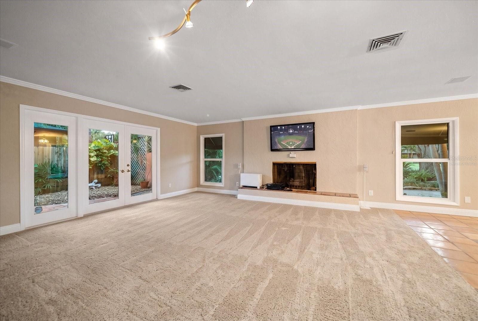 Living Room - Virtually Staged with Carpet - 3033 82ND WAY N, ST PETERSBURG