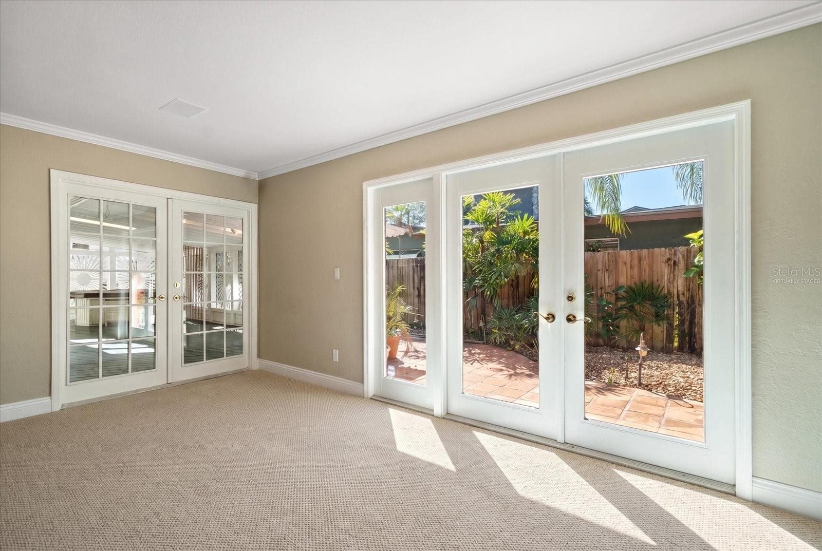 Living room - Virtually Staged with Carpet - 3033 82ND WAY N, ST PETERSBURG