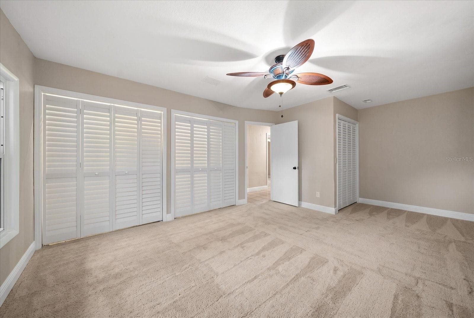 Primary Bedroom - Virtually Stage with Carpet - 3033 82ND WAY N, ST PETERSBURG