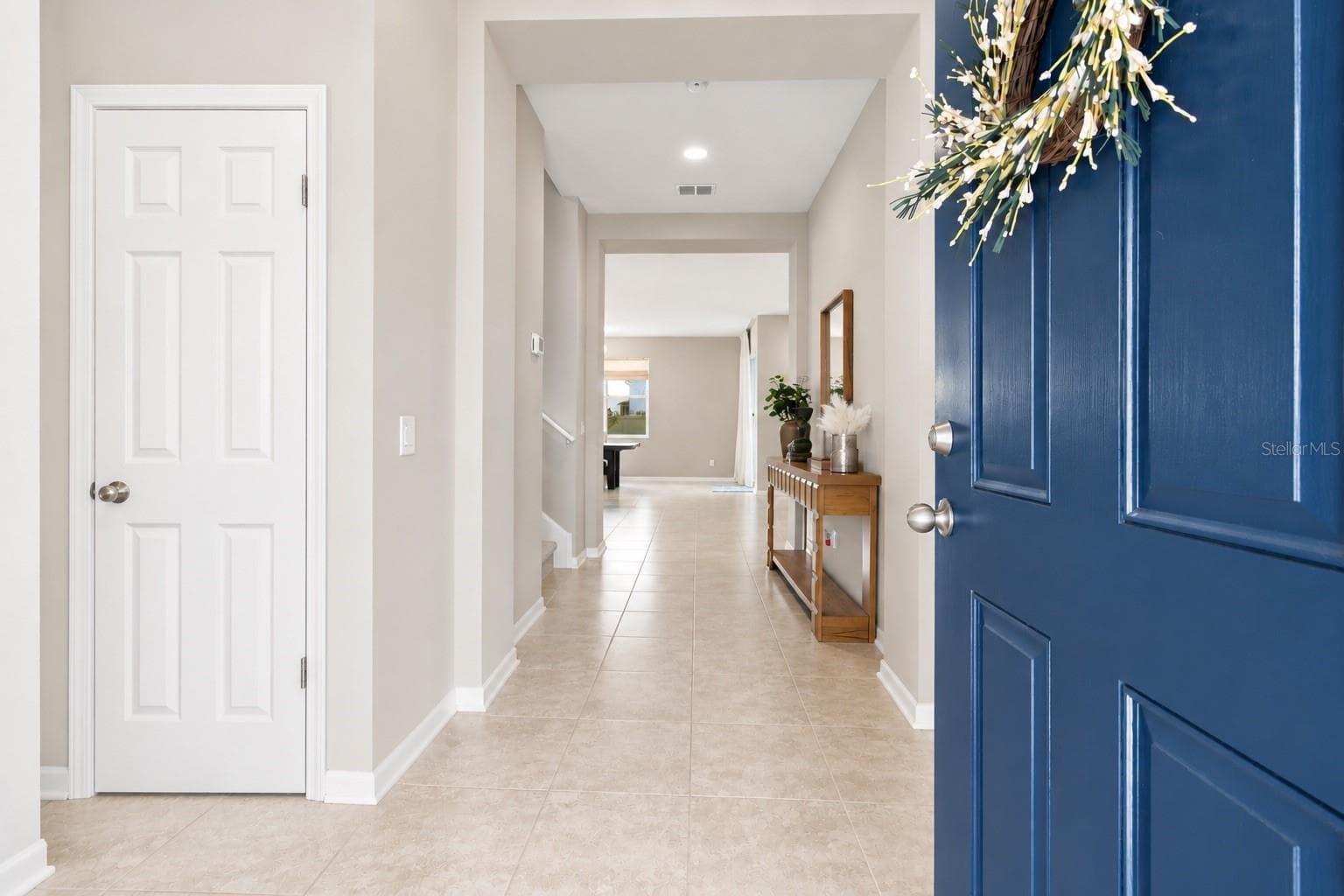 Cobalt blue door welcomes you in. - 31840 SAPNA CHIME DR, WESLEY CHAPEL