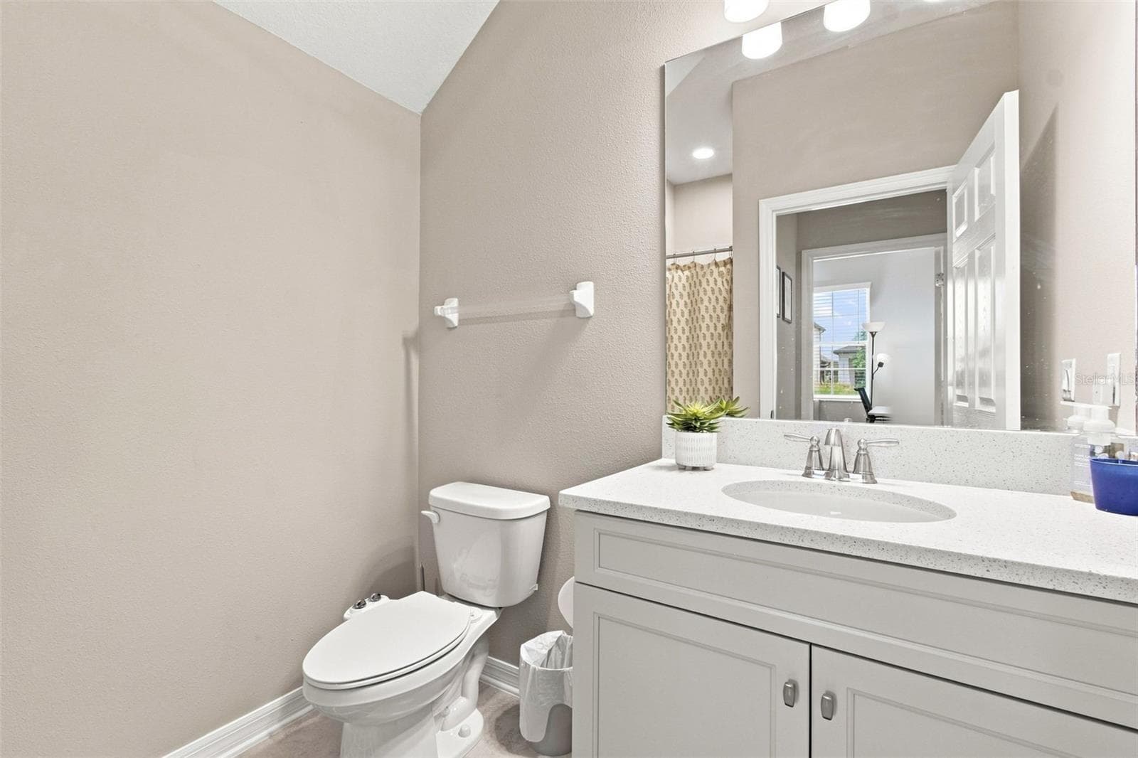 Convenient guest bathroom on first floor. - 31840 SAPNA CHIME DR, WESLEY CHAPEL
