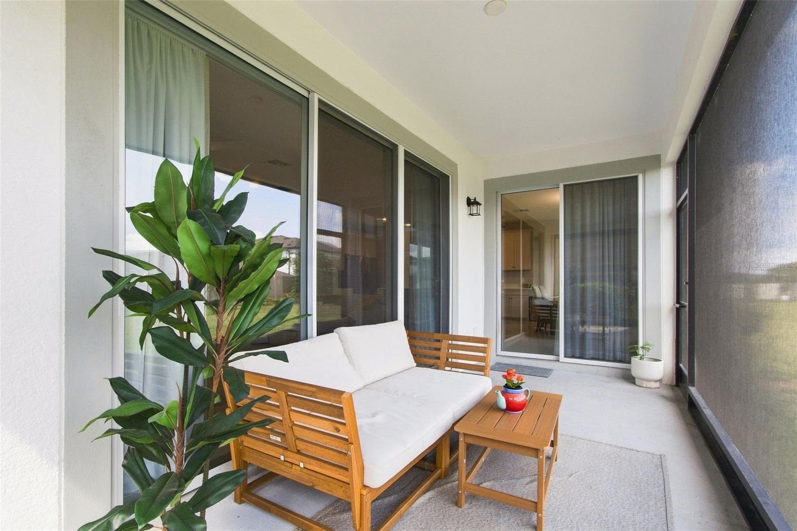 Screened-in lanai - 31840 SAPNA CHIME DR, WESLEY CHAPEL