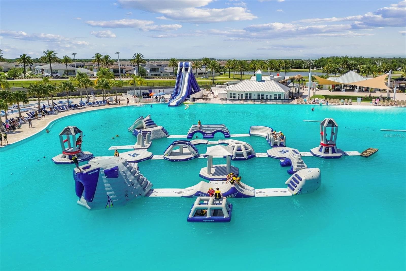 Bounce house in the middle of the lagoon for hours of entertainment - 31840 SAPNA CHIME DR, WESLEY CHAPEL