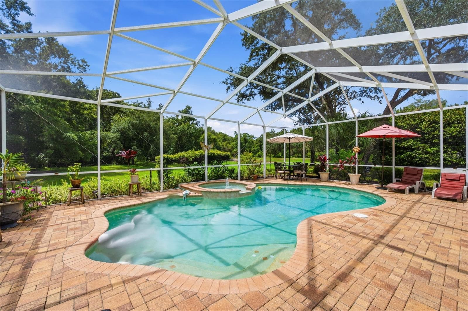 Single Family Residence at 10531 MIRACLE LN, NEW PORT RICHEY, photo 2 of 70
