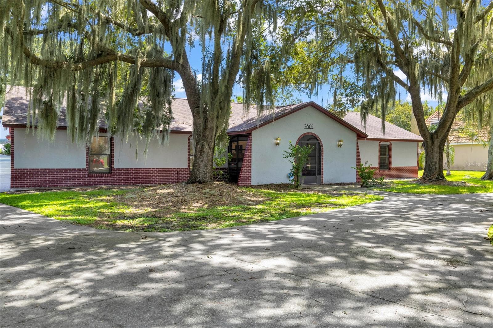 As well as driveway leading to the garage - 2805 LAKE TOHOPEKALIGA BLVD, KISSIMMEE