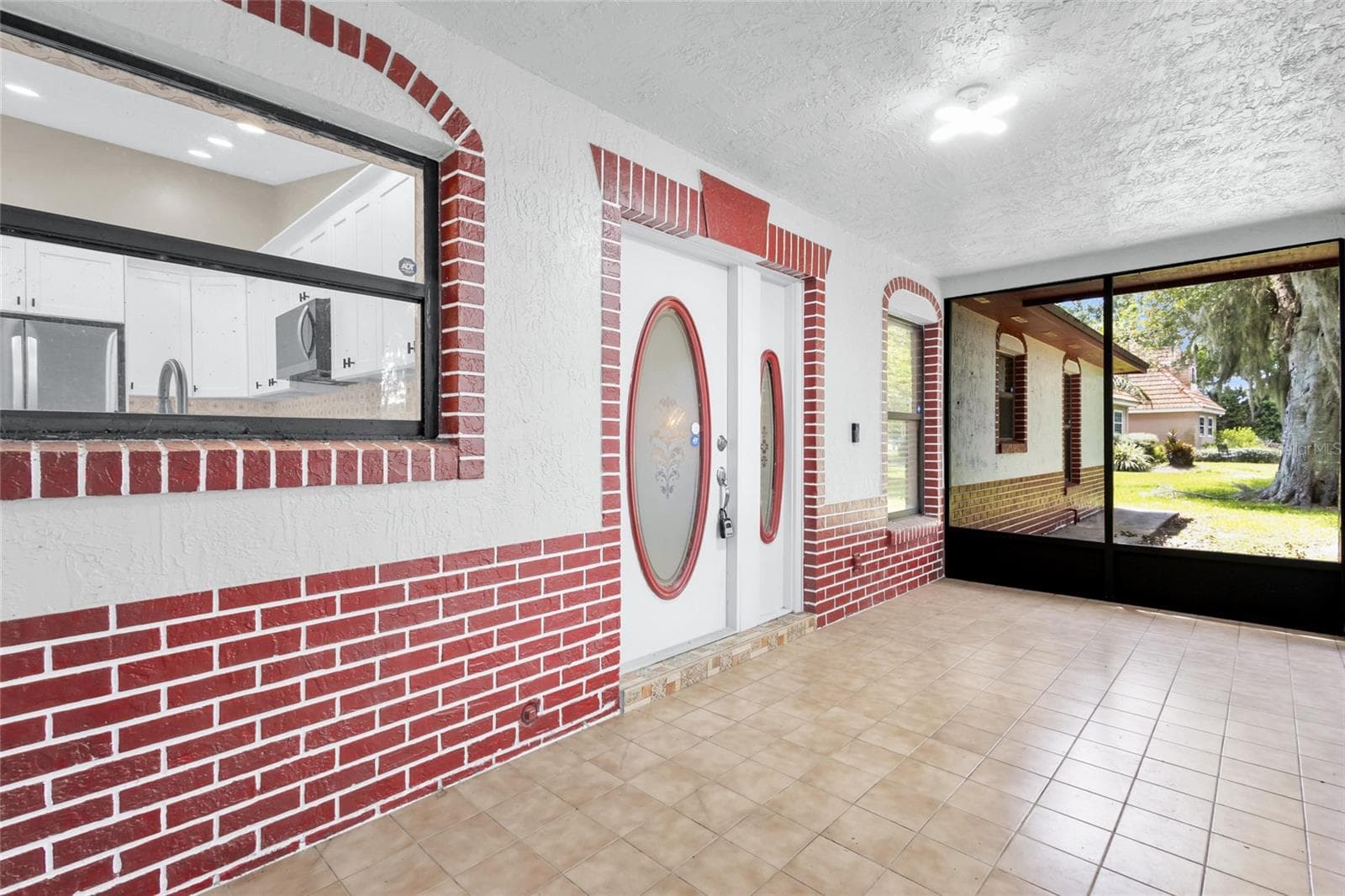 Screened front porch - 2805 LAKE TOHOPEKALIGA BLVD, KISSIMMEE