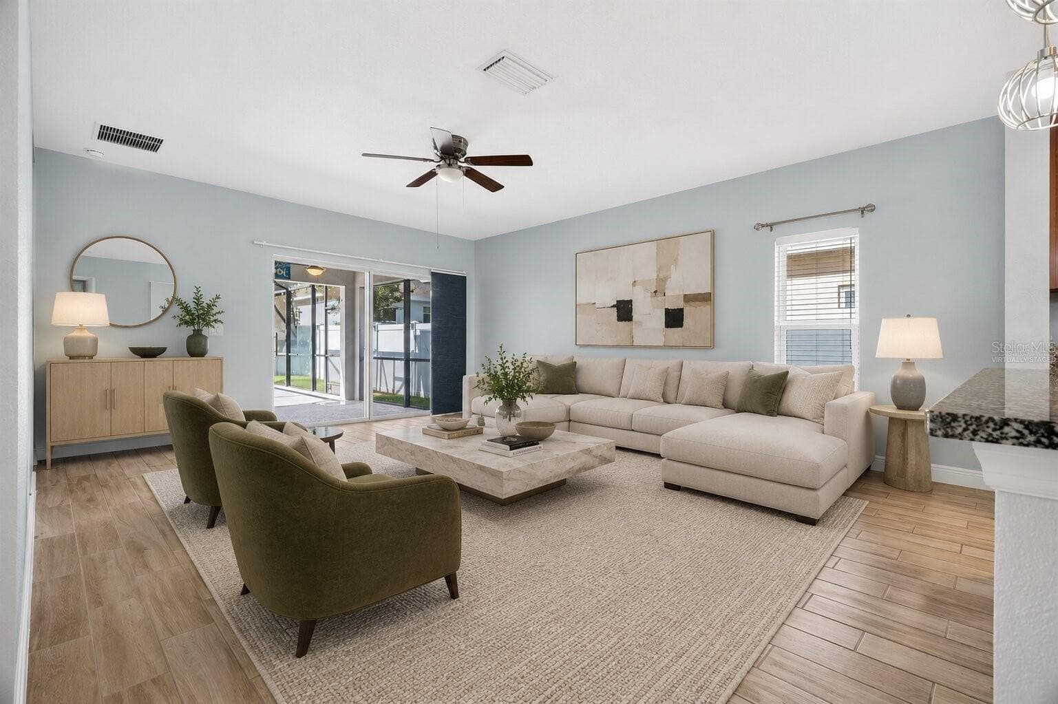 Virtually Staged Living Room leading to the lanai - 878 BENJAMIN TRL, DAVENPORT