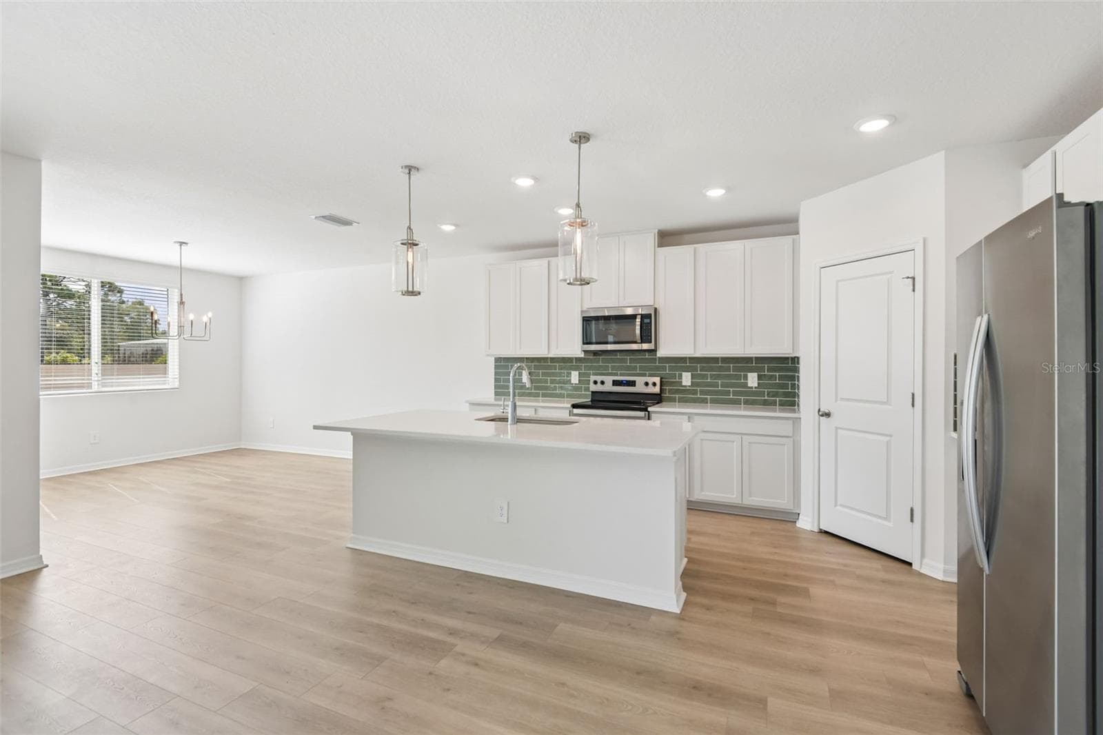 Single Family Residence at 14152 HARVEST PINES LN, HUDSON, photo 9 of 39