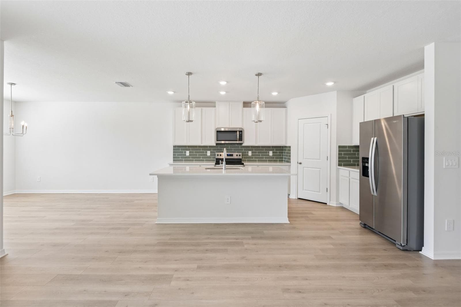 Single Family Residence at 14152 HARVEST PINES LN, HUDSON, photo 10 of 39