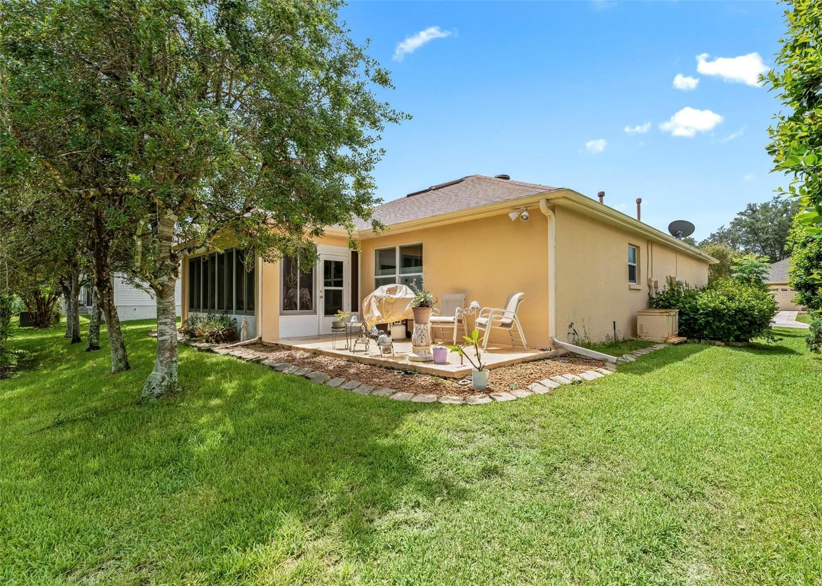 back and side yard - 8368 SE 176TH LAWSON LOOP, THE VILLAGES