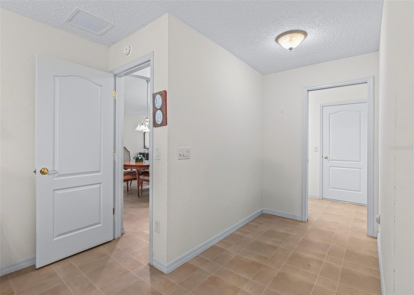 office area and laundry room with door to garage - 8368 SE 176TH LAWSON LOOP, THE VILLAGES
