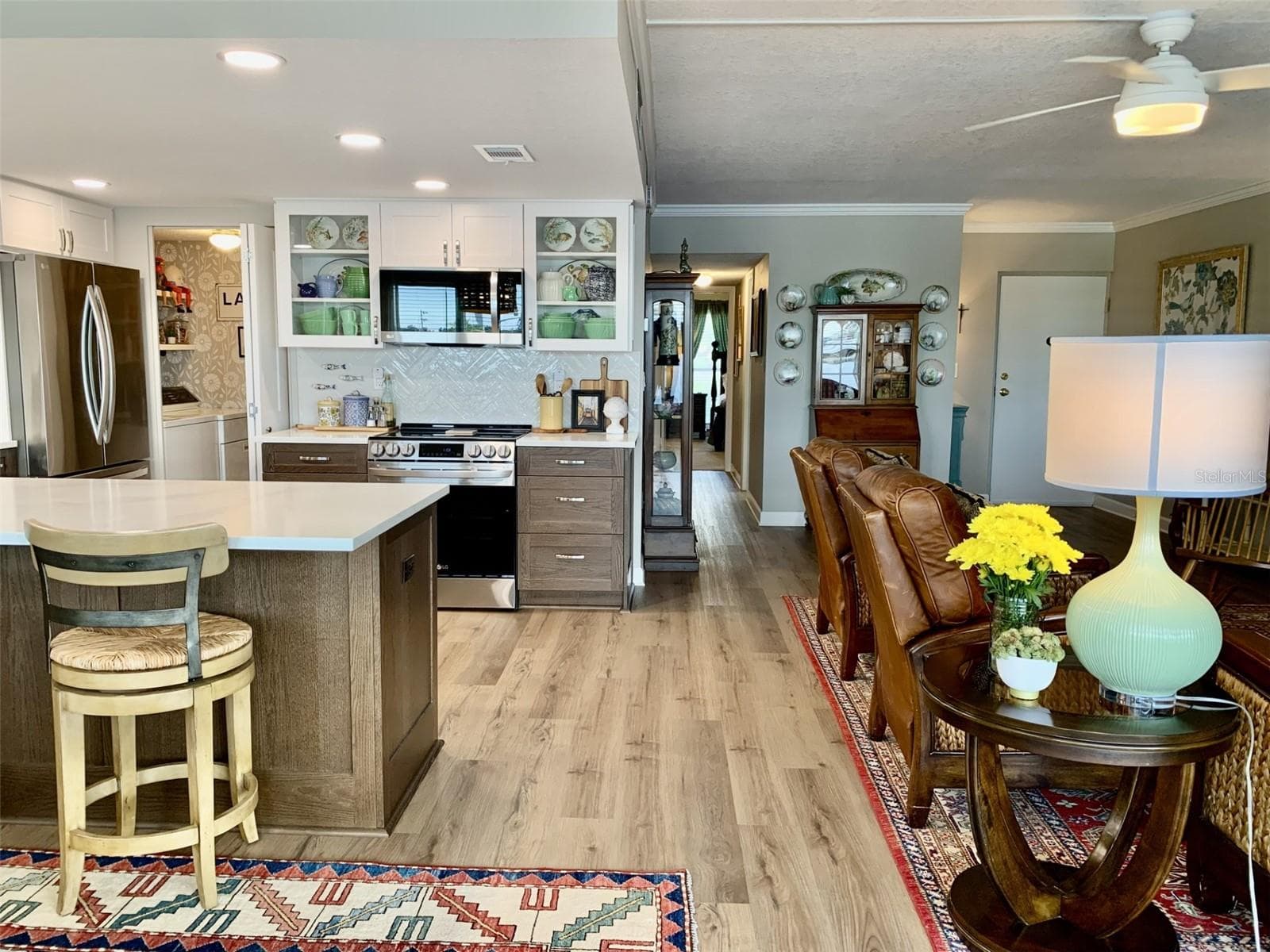 View from windows looking back at the foyer, hall, living room, kitchen - 1655 S HIGHLAND AVE #I379, CLEARWATER
