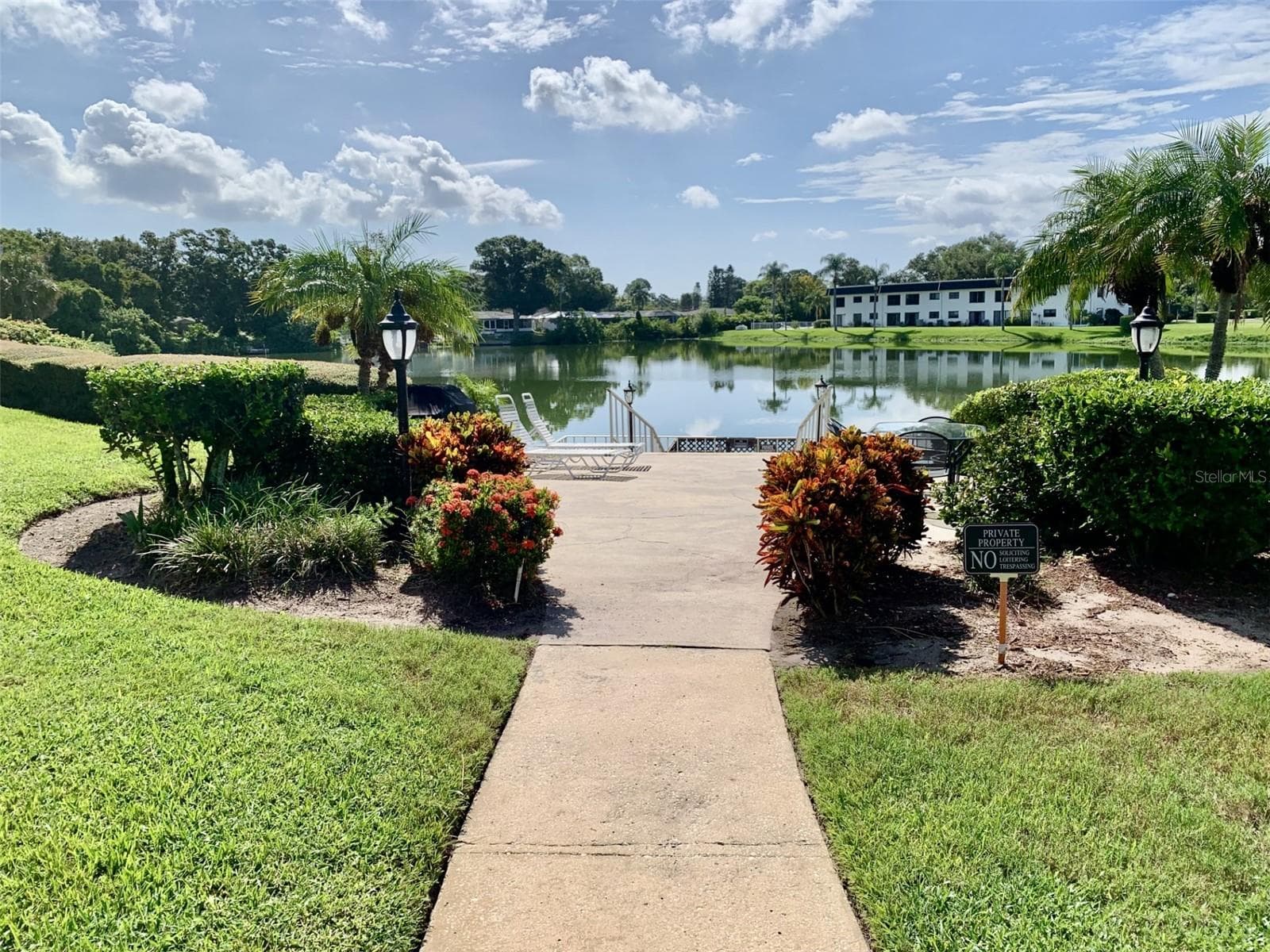 BBQ area and dock on pond - 1655 S HIGHLAND AVE #I379, CLEARWATER