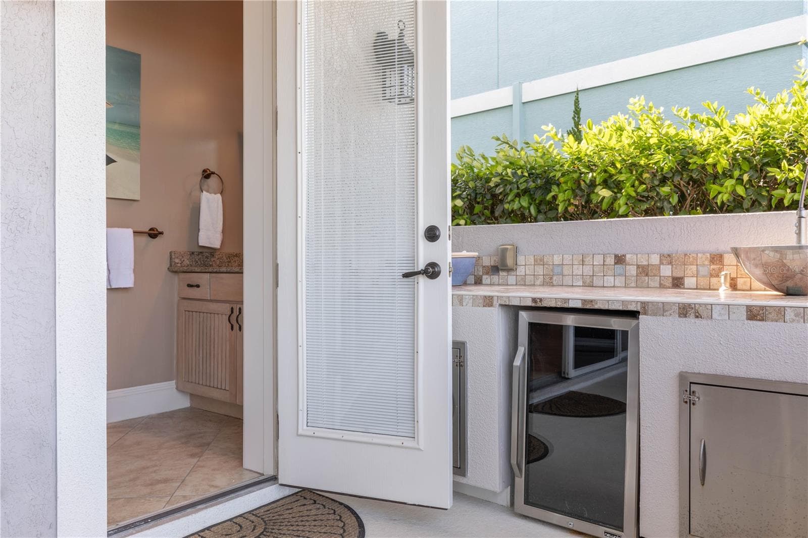 1/2 bath outside by pool - 12 CINNAMON BEACH WAY, PALM COAST