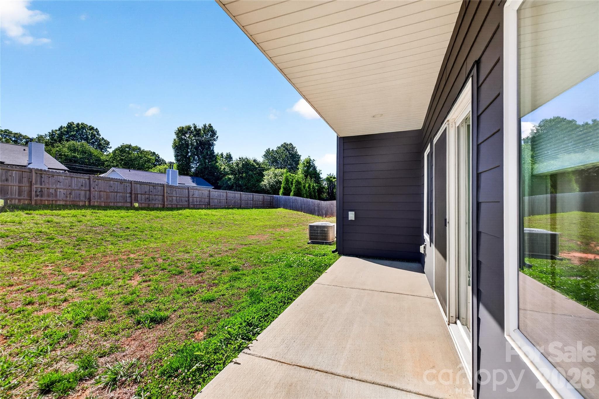 Covered back porch. - 5044 Double Lakes Drive, Charlotte