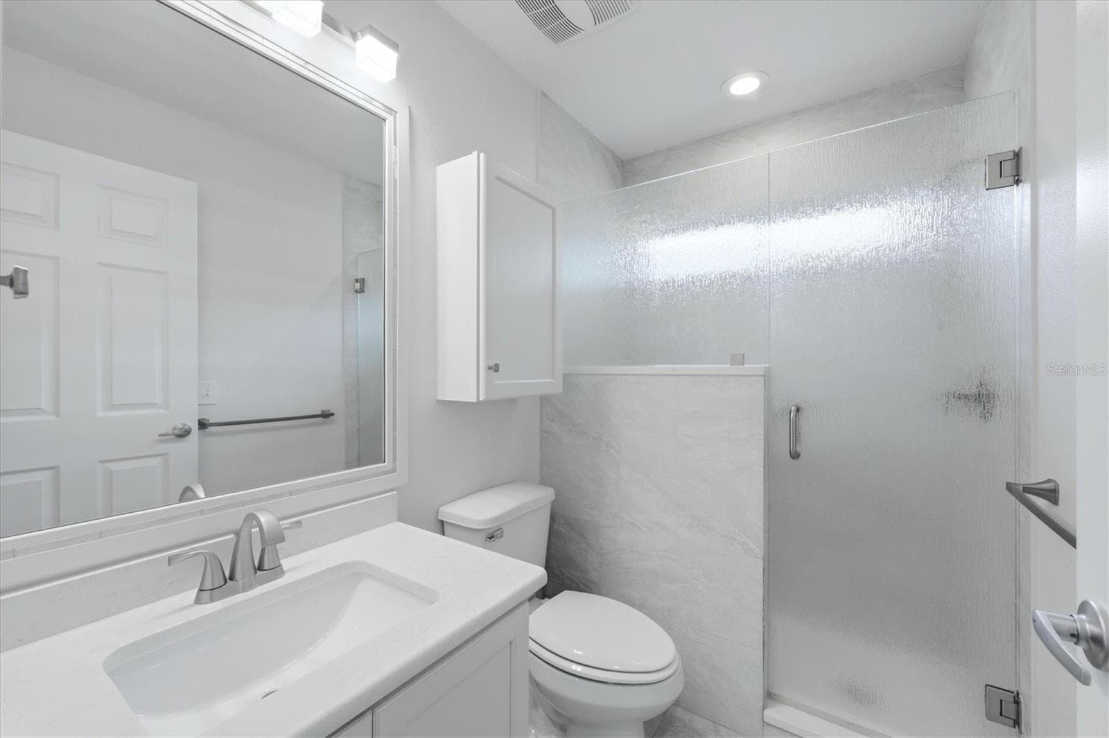 Guest Bathroom has been updated with ceramic tile and has a walkin shower with bench. - 259 PARK FOREST BLVD, ENGLEWOOD