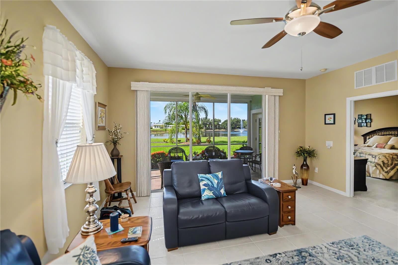 Volume ceilings throughout. - 25545 HERITAGE LAKE BLVD #21, PUNTA GORDA