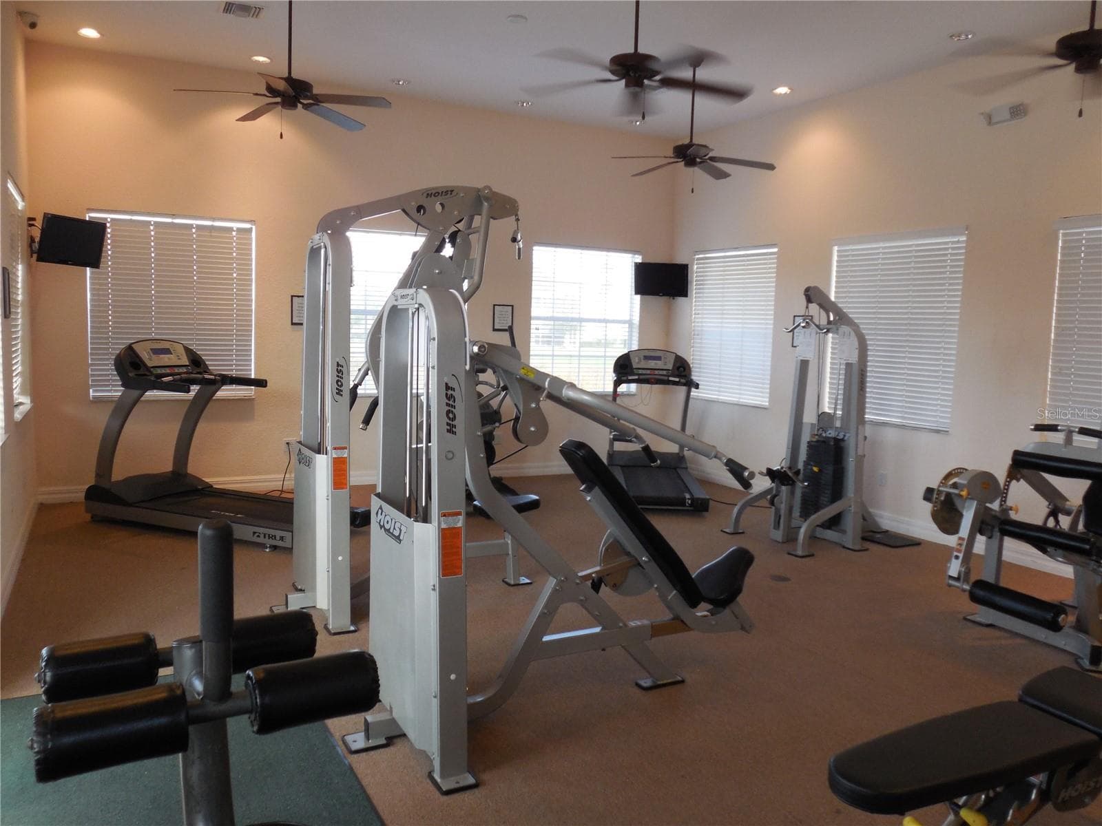 nicely appointed fitness center - 25545 HERITAGE LAKE BLVD #21, PUNTA GORDA