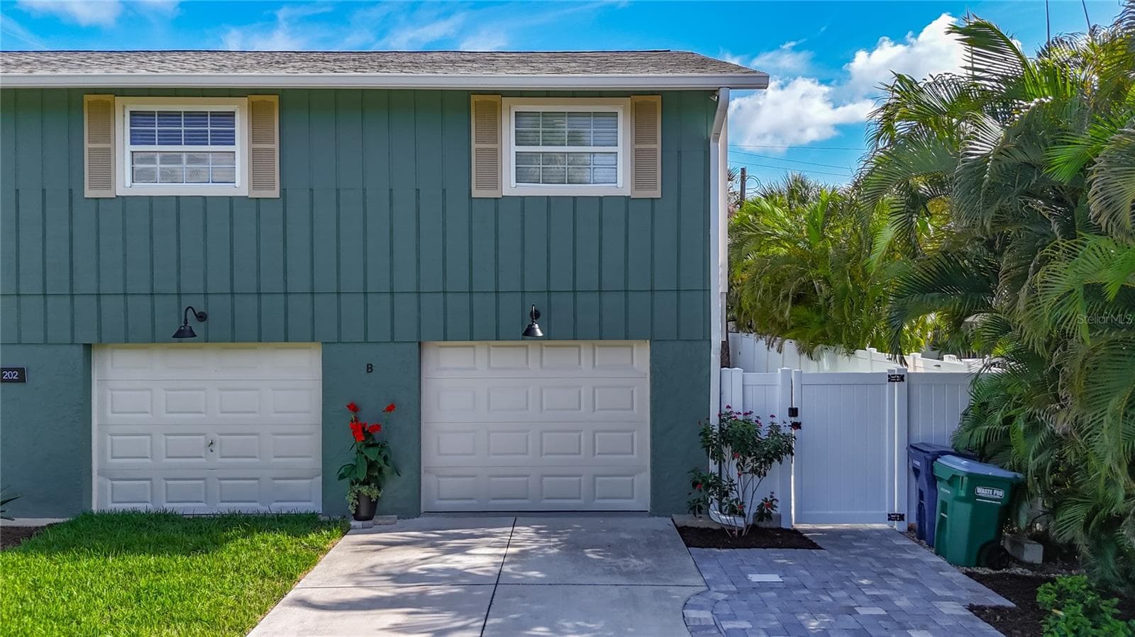 Tandem 2 car and the 3rd space with 2 separate garage doors - 202 PEACOCK  UNIT B LN #B, HOLMES BEACH
