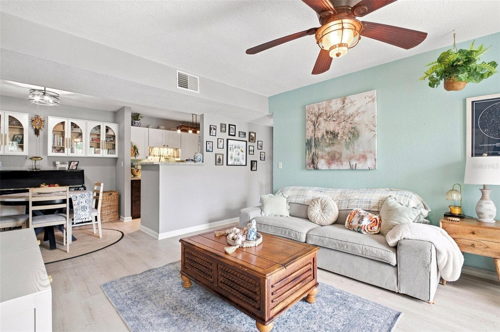 Living Room, Dining Room into kitchen with pantry - 455 ALT 19 S #17, PALM HARBOR