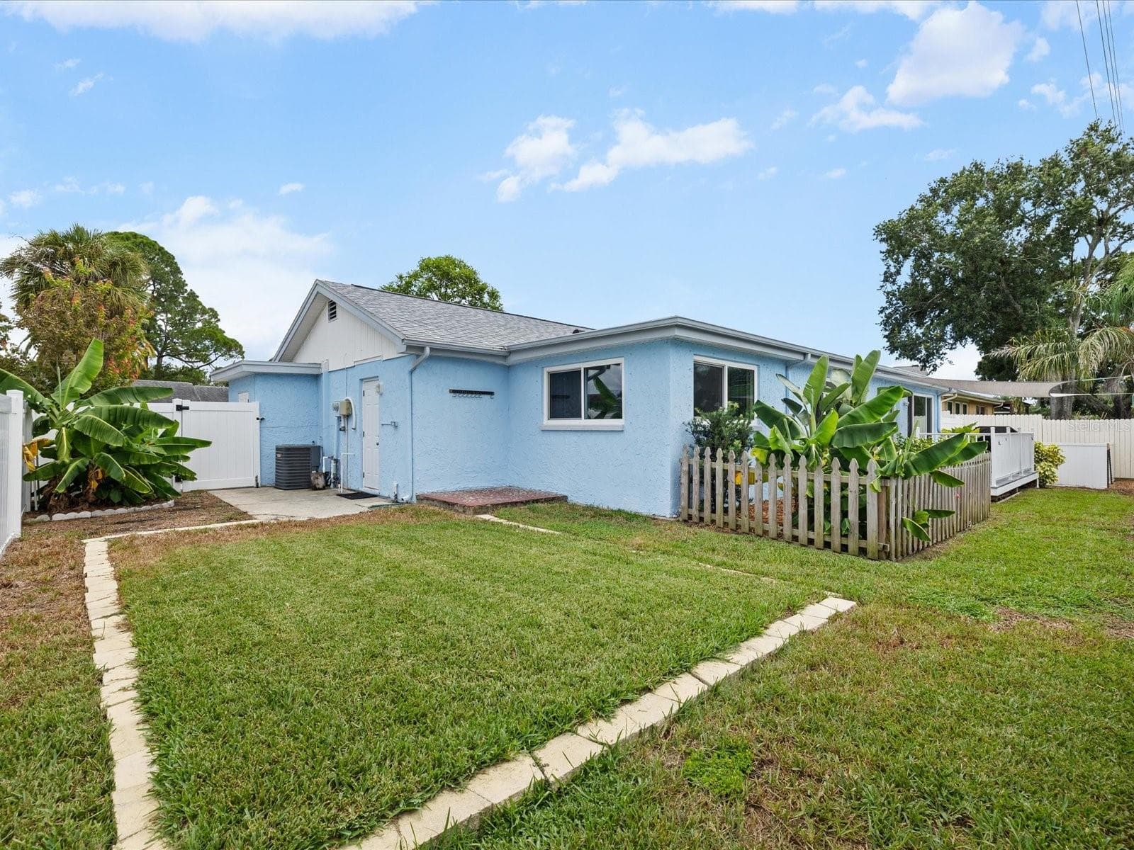 Lawn equipment storage beside A/C - 3845 MING TREE DR, NEW PORT RICHEY
