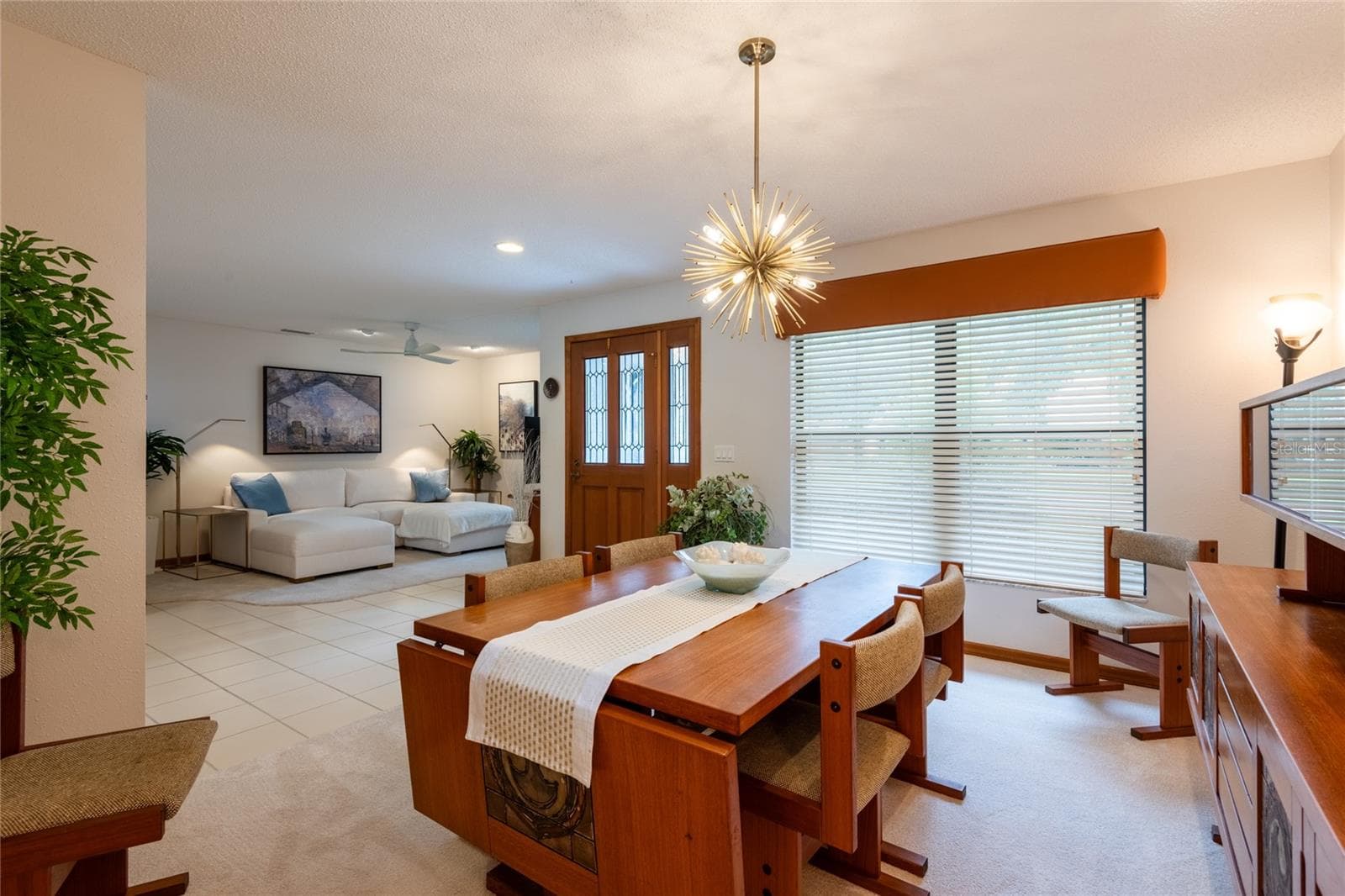 First family room open to dining room - 16509 E COURSE DR, TAMPA