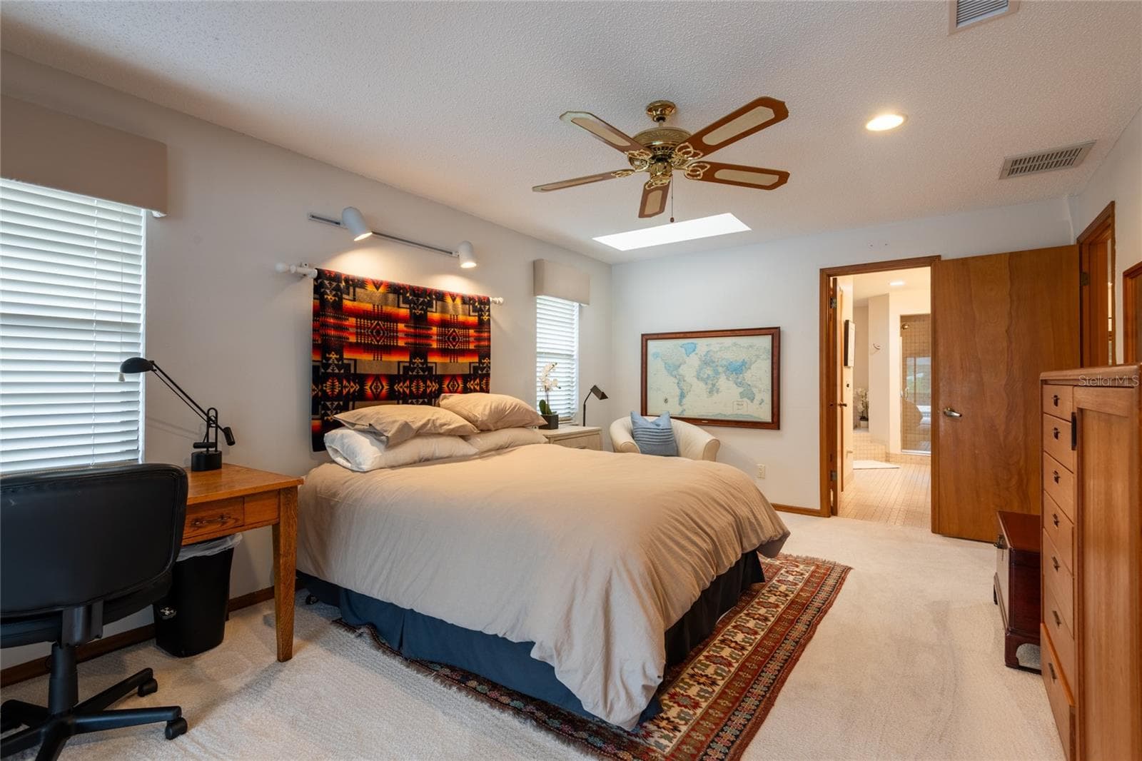 Primary suite leading out to the sparkling pool overlooking the gold course - 16509 E COURSE DR, TAMPA