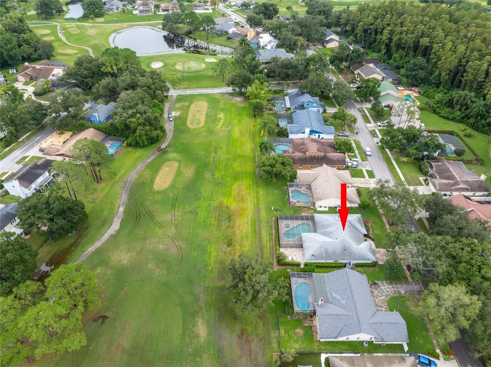 Drone photos showing the location of the home and surrounding areas - 16509 E COURSE DR, TAMPA