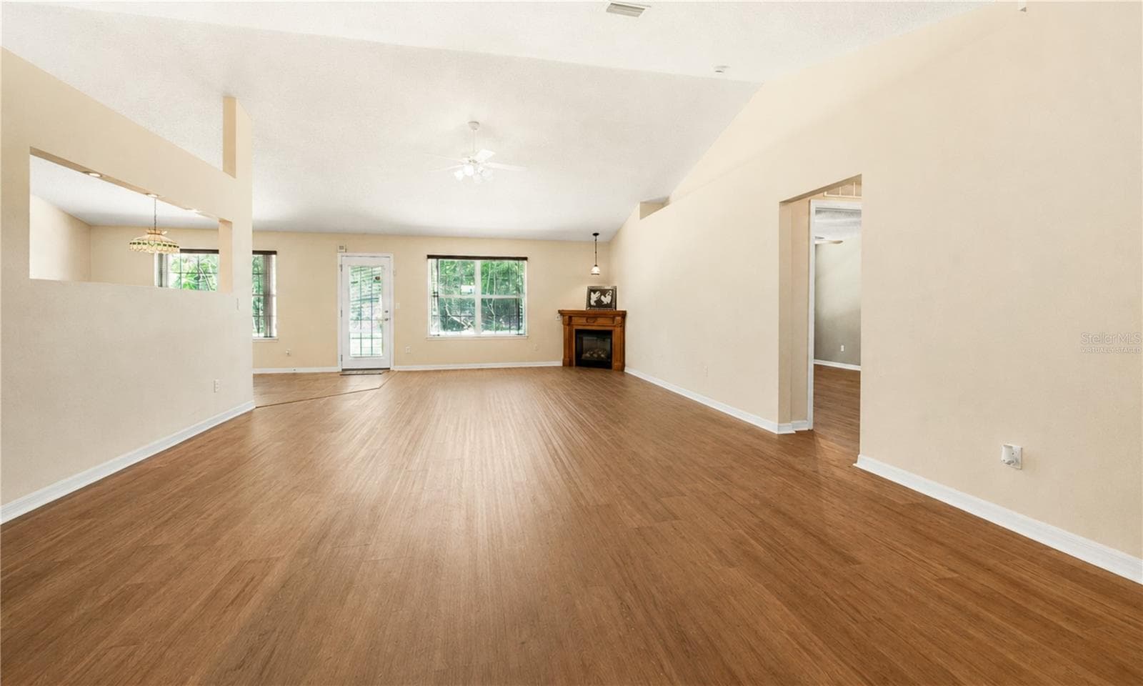 Virtually Staged Front Entrance View to Great Room without Light and Pool Table - 38 PRINCESS ROSE DR, PALM COAST