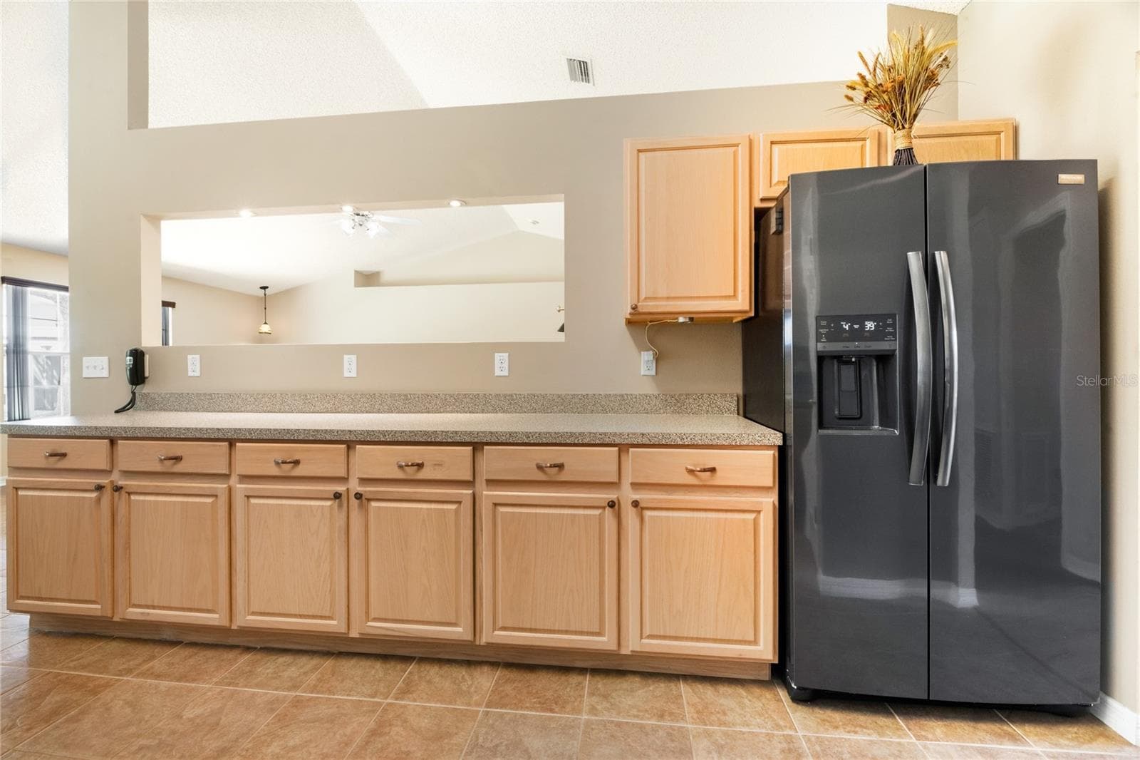 Kitchen with a view into the Great Room - 38 PRINCESS ROSE DR, PALM COAST