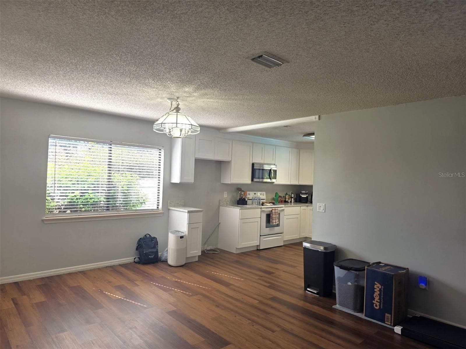 Dining Room to Kitchen - 1040 W VILLAGE GREEN RD, DELAND