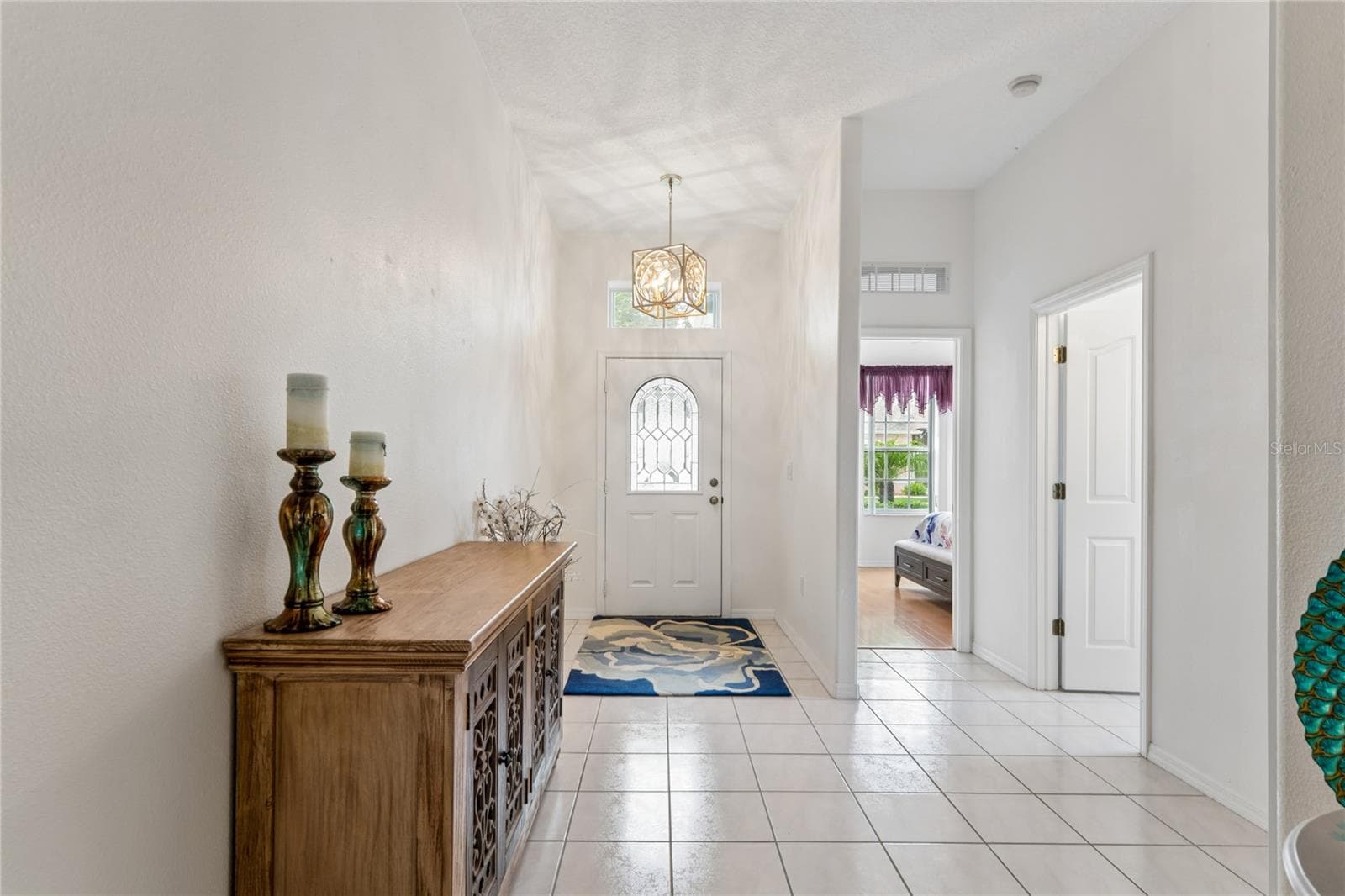 TILE FLOORING THROUGHOUT LIVING AREA - SUMMERTREE PRCL 03A PH 02, NEW PORT RICHEY