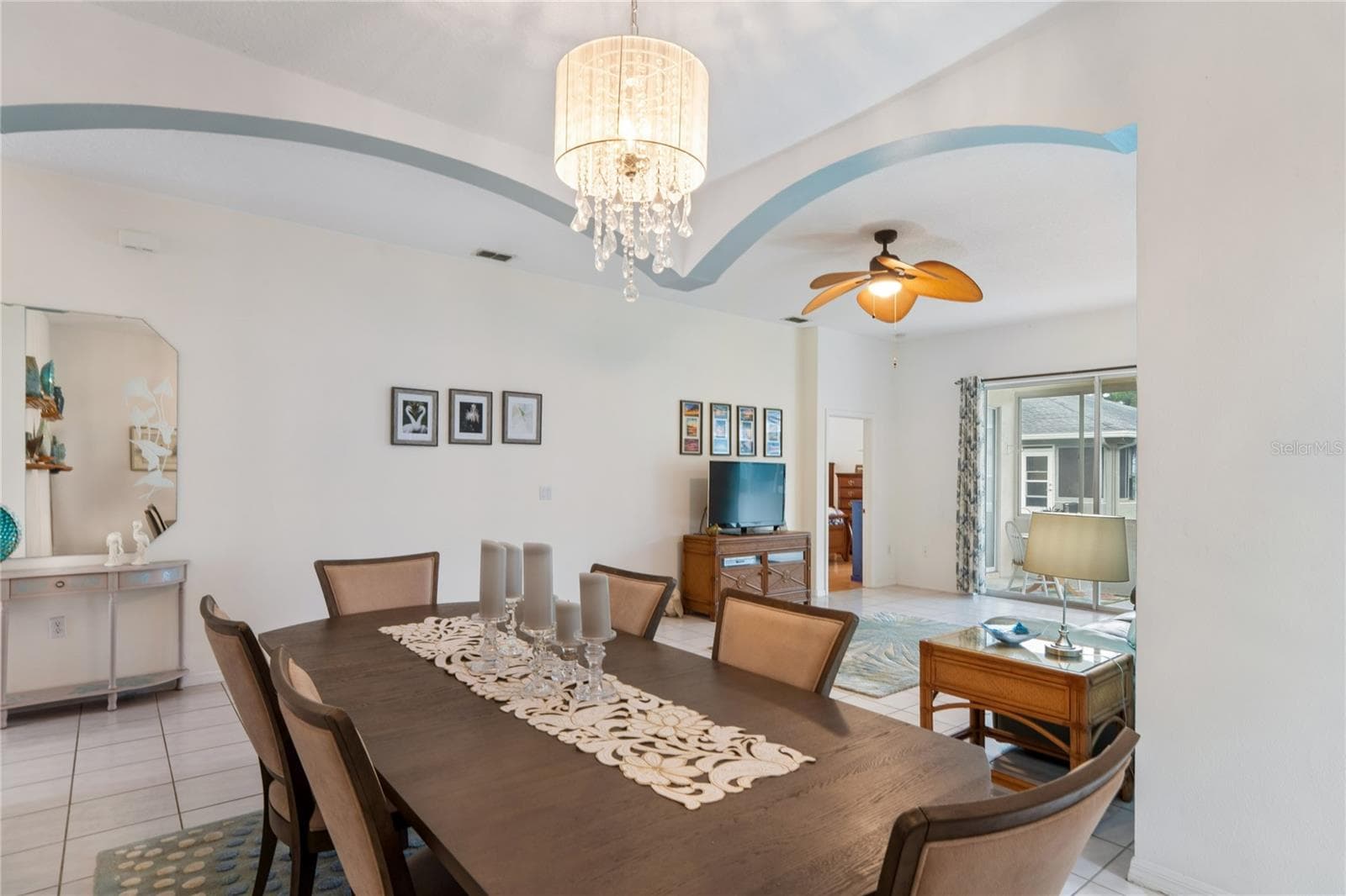 VIEW FROM DINING ROOM LOOKING TOWARD LIVING AREA AND PRIMARY BEDROOM - SUMMERTREE PRCL 03A PH 02, NEW PORT RICHEY