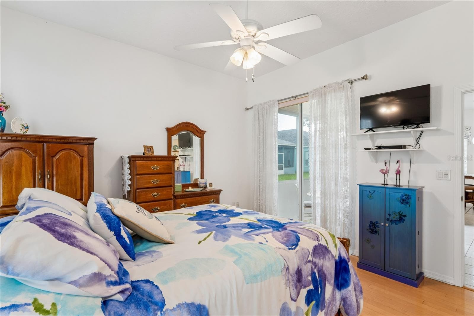 MASTER BEDROOM WITH SGD AND WOOD FLOOR - SUMMERTREE PRCL 03A PH 02, NEW PORT RICHEY