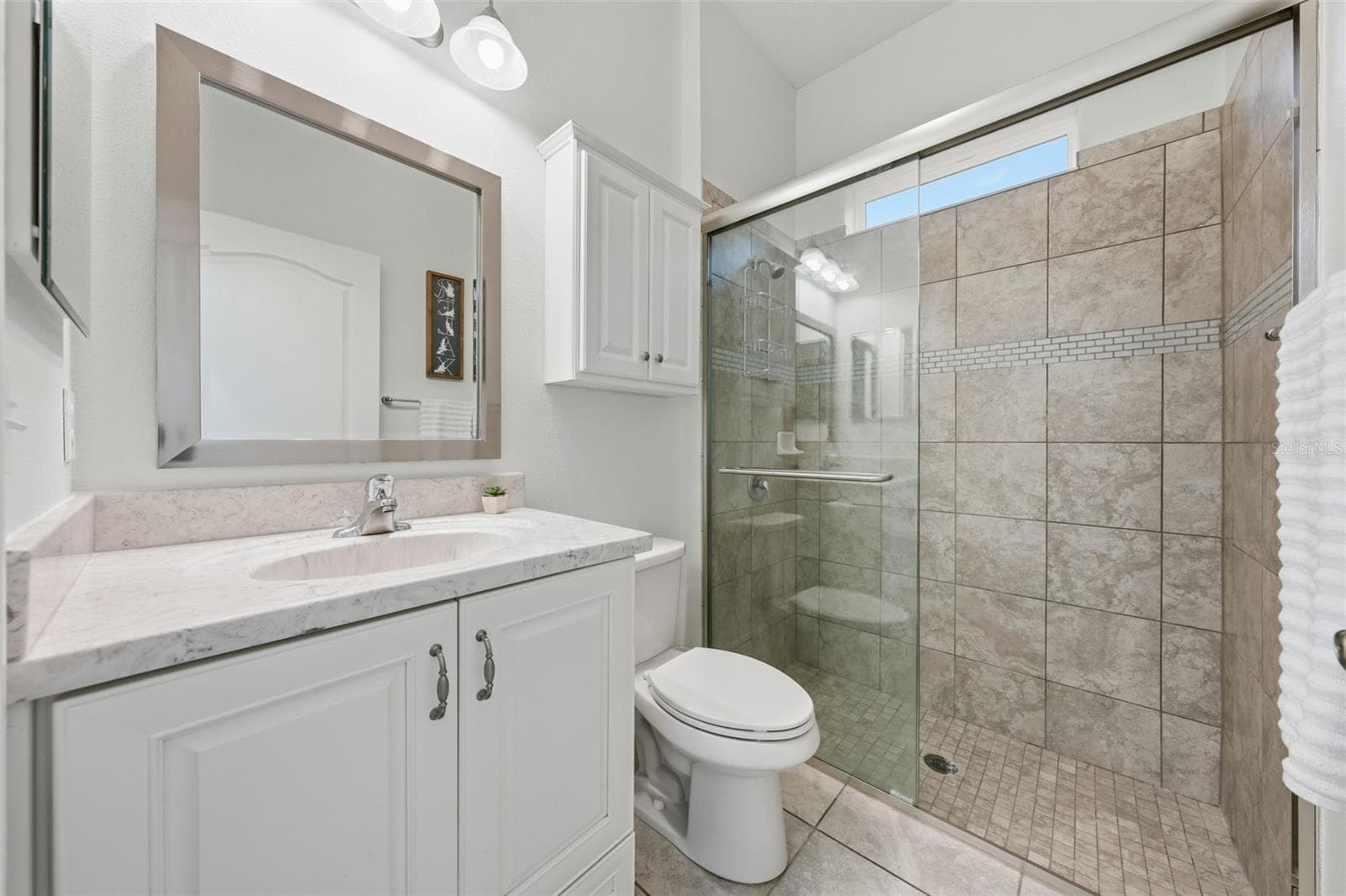 Bathroom 3 features tiled walk-in shower - 16716 ABBEY HILL CT, CLERMONT