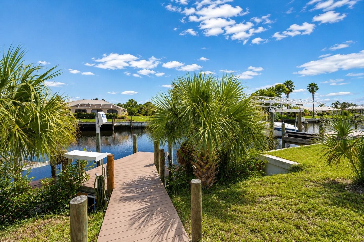 boat deck with fishing table, water and electricity connected. - 4394 LIBRARY ST, PORT CHARLOTTE